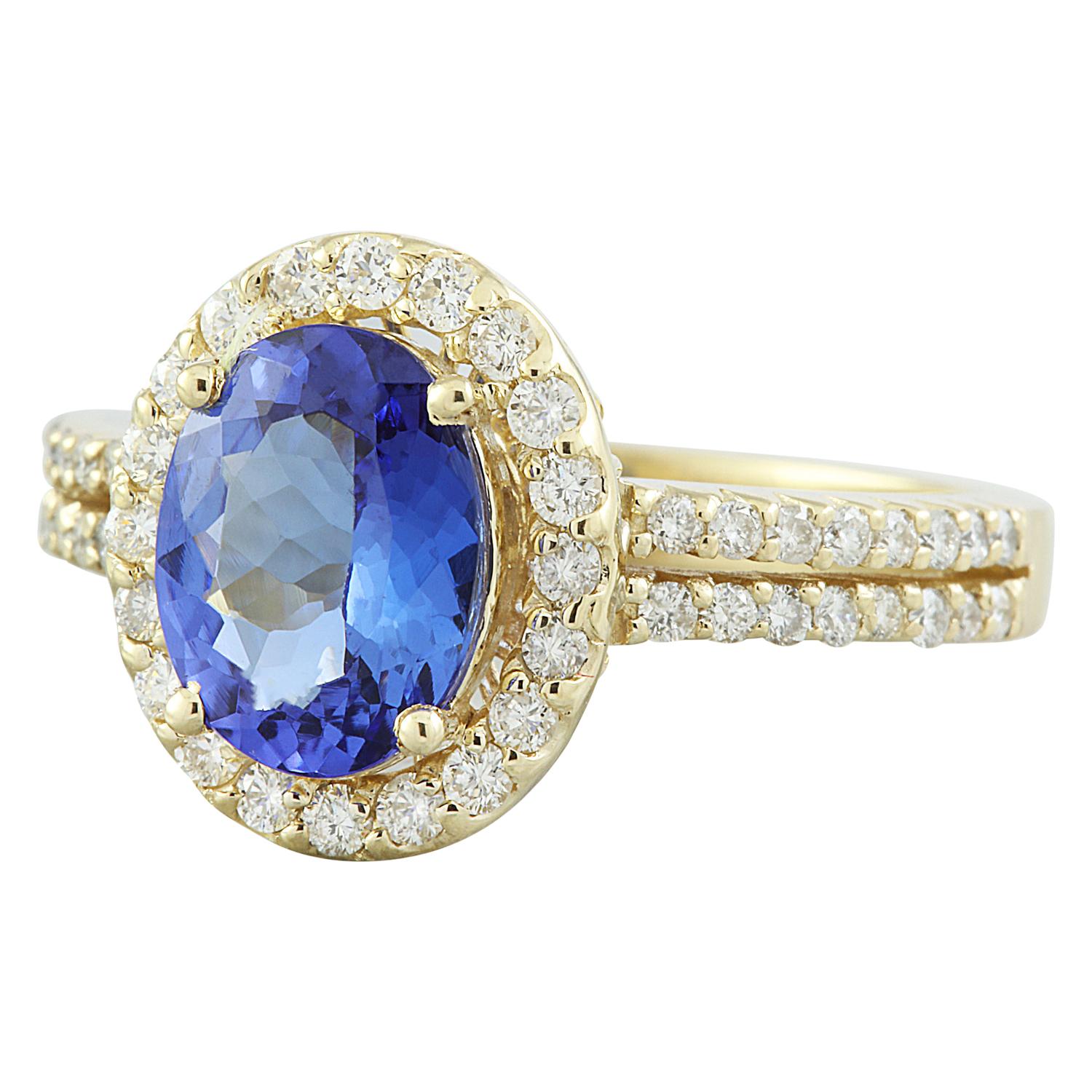 Discover the unparalleled beauty of this Natural Tanzanite Diamond Ring, a true masterpiece crafted in solid 14K Yellow Gold. Weighing a total of 2.34 carats, this ring embodies elegance and sophistication, destined to adorn the hand of a discerning
