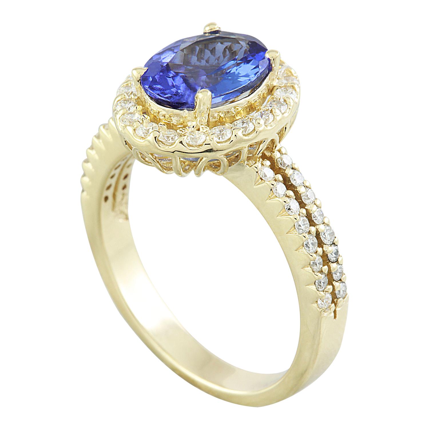 Modern Exquisite Natural Tanzanite Diamond Ring in 14K Yellow Gold For Sale