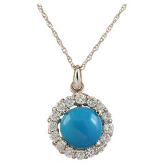 Collier exquis en or blanc 14 carats avec turquoise naturelle et diamants