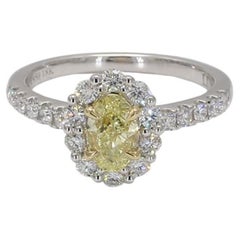 GIA Certified Natural Yellow Oval and White Diamond 1.25 Carat TW Platinum Ring