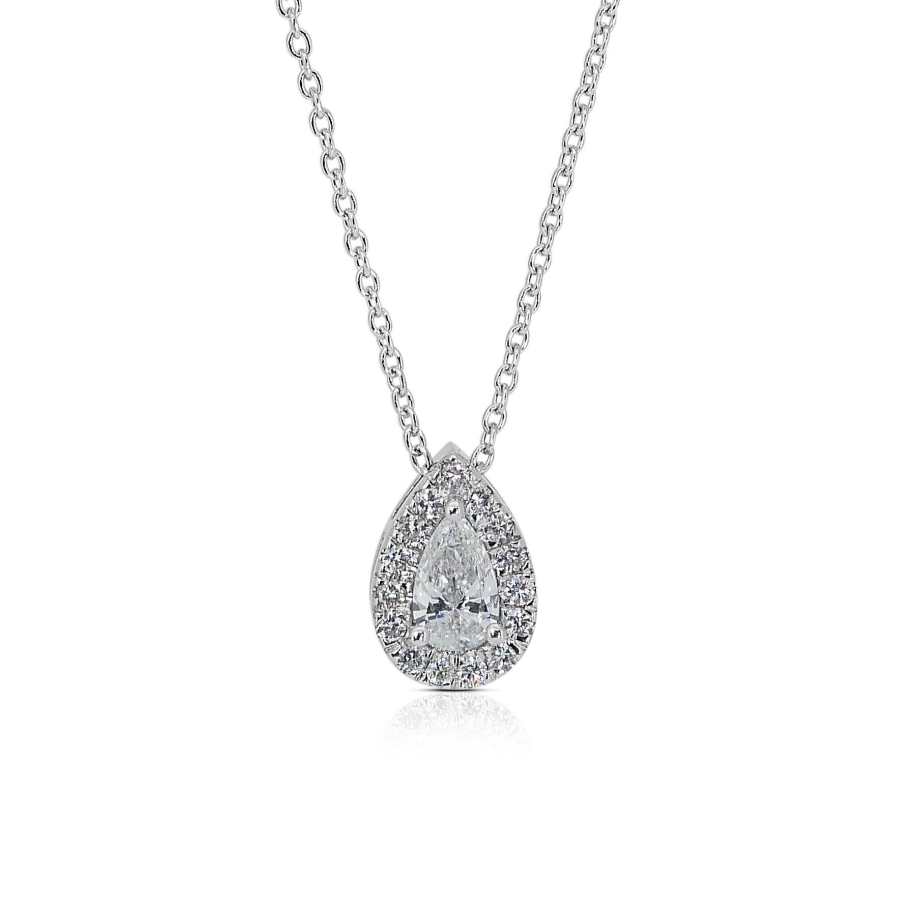 This exquisite pendant features a radiant 0.3-carat pear-shaped natural diamond as its centerpiece, surrounded by a halo of 15 sparkling side diamonds totaling 0.18 carats. Crafted from gleaming 18K white gold, this pendant radiates elegance and
