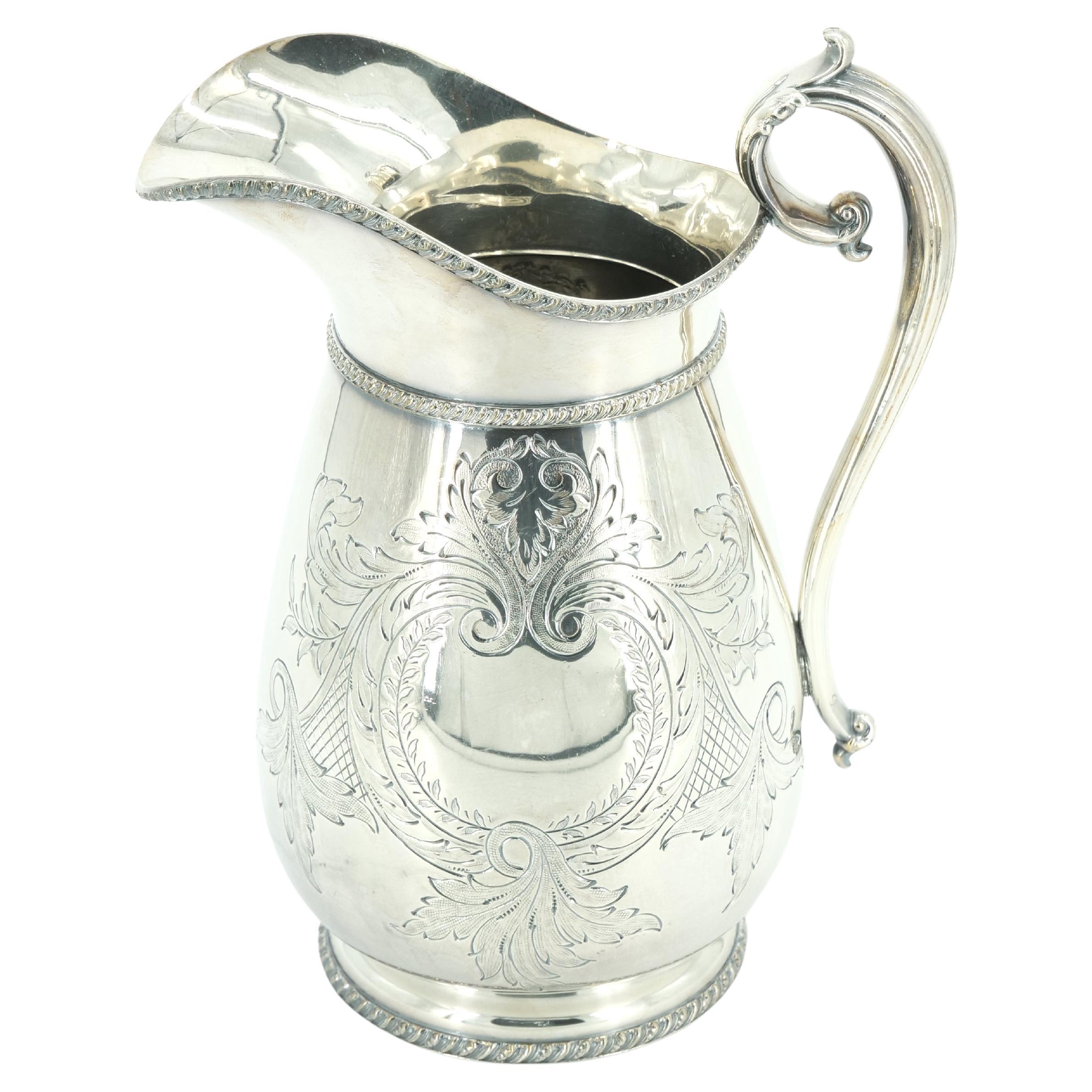 Exquisita jarra para servir de la antigua vajilla inglesa Sheffield bañada en plata