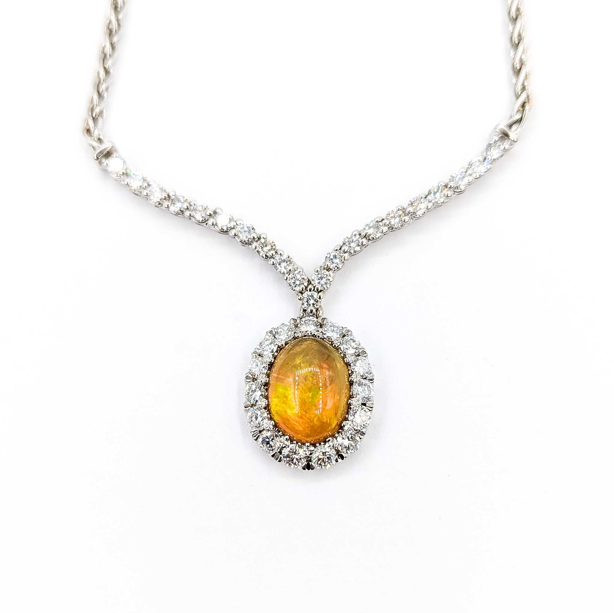 Squisita collana con opale e diamanti in oro bianco 18 carati

Questo splendido gioiello è una squisita collana di opale e diamanti, sapientemente realizzata in oro bianco 18 carati. Il punto focale di questa ipnotica collana è un'opale brillante,
