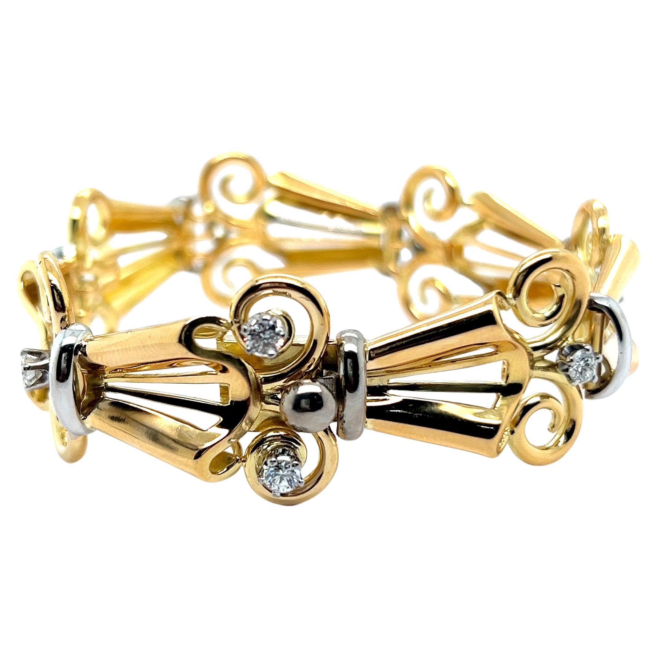 This exquisite bracelet, designed from 18 Karat yellow and white gold, highlights an ornate design that exudes elegance. Adorned with 8 brilliant-cut diamonds of G-H color and vs clarity, totaling 0.80 carats, it sparkles with sophistication. The
