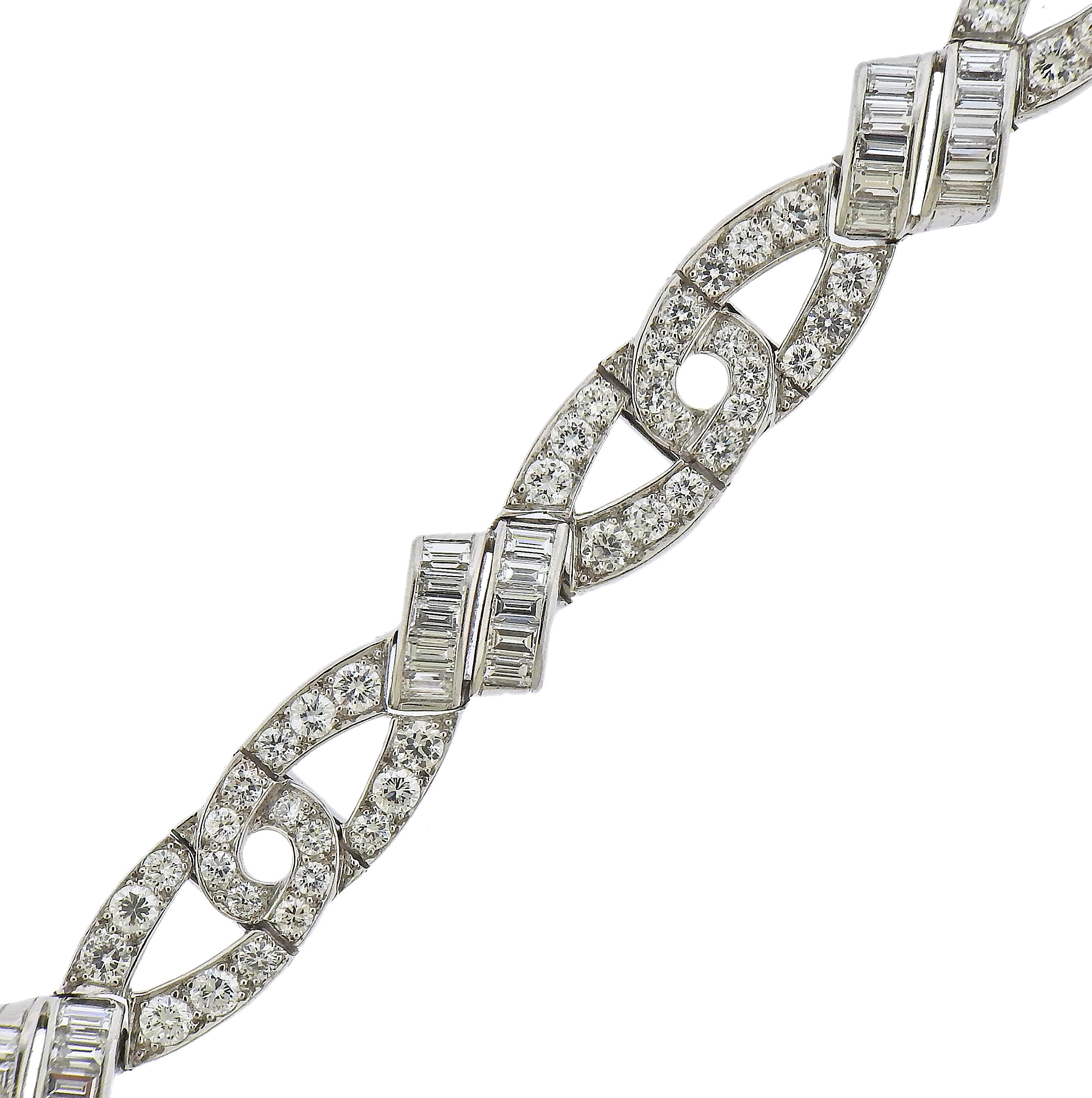 Gorgeous platinum bracelet by Oscar Heyman Bros., set with baguette and round diamonds - total approx. 7 to 7.50cts. Bracelet is 7.25