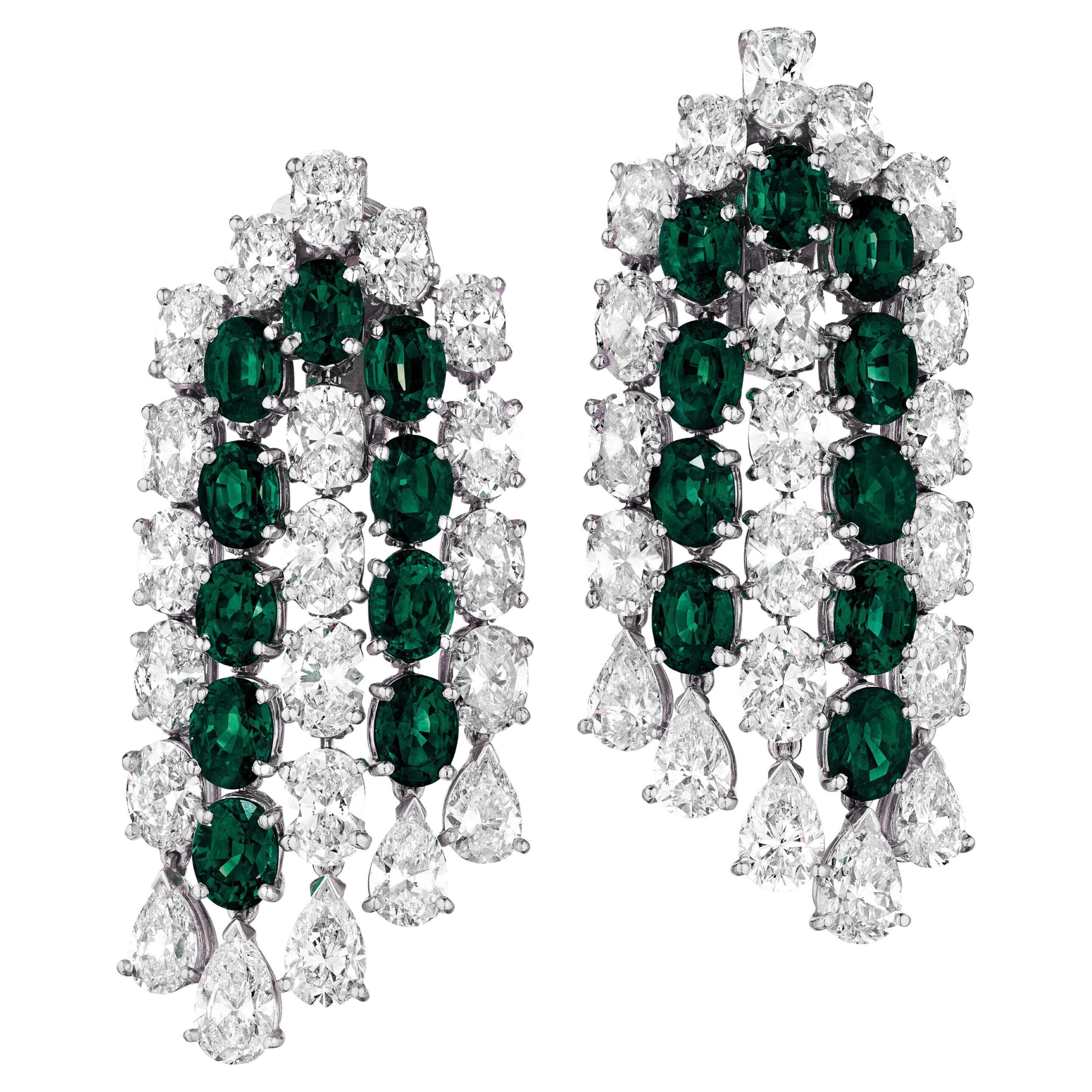 exquisite oval and cushion-shaped emeralds and diamonds dangle earrings
