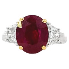 Exquisite Oval-Cut Ruby and Diamond Halo Engagement Ring in 14K White Gold