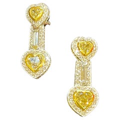 Exquisite Pair of 10.12 Carat Fancy Yellow and White Diamond Heart Drop Earrings