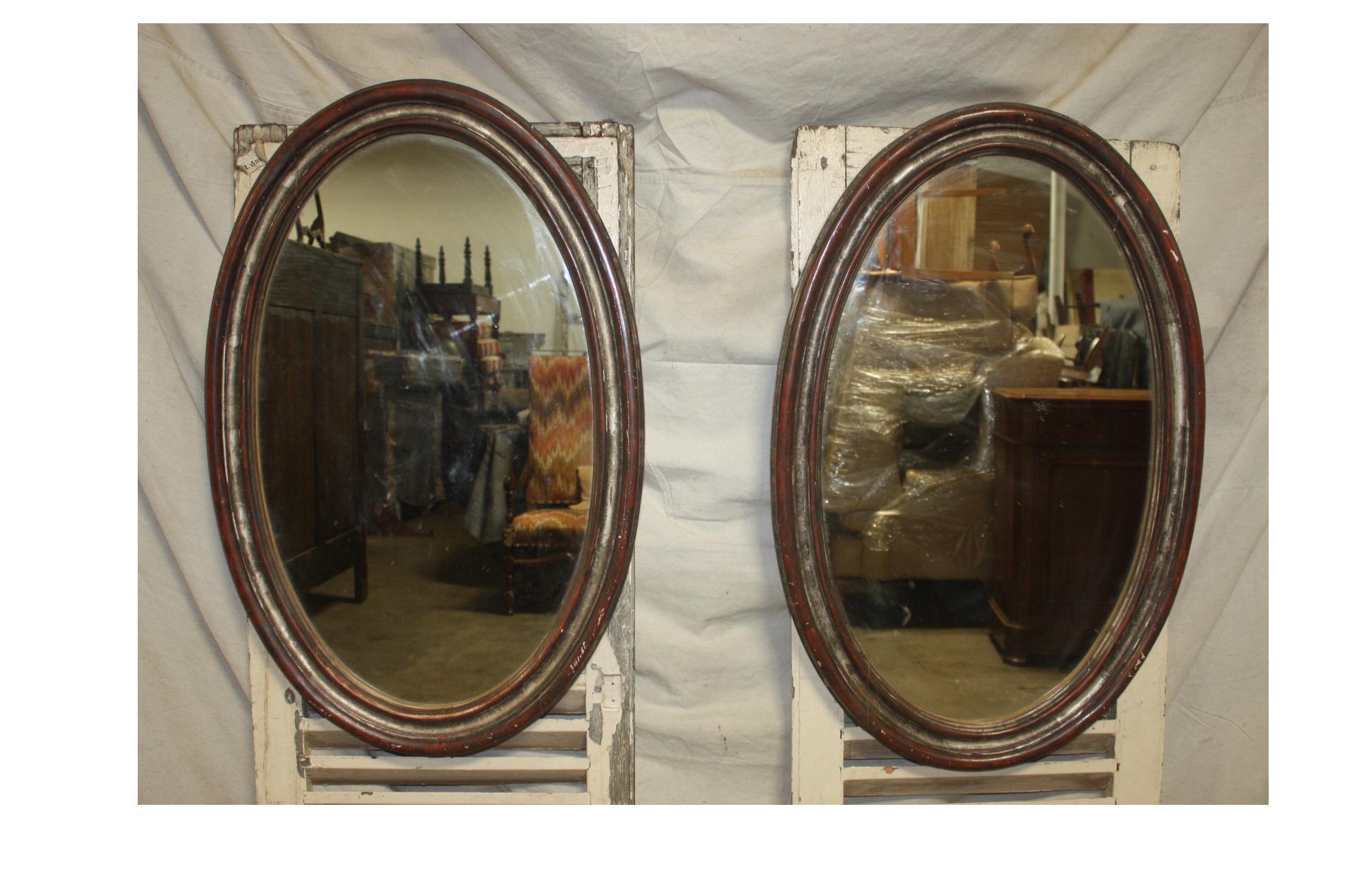 Exquisite pair of 19th century French mirrors.