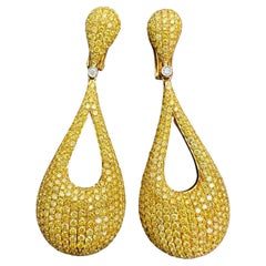 Exquisite Pair of 9.81 Carat Fancy Intense Yellow Diamond Pear Drop Earrings