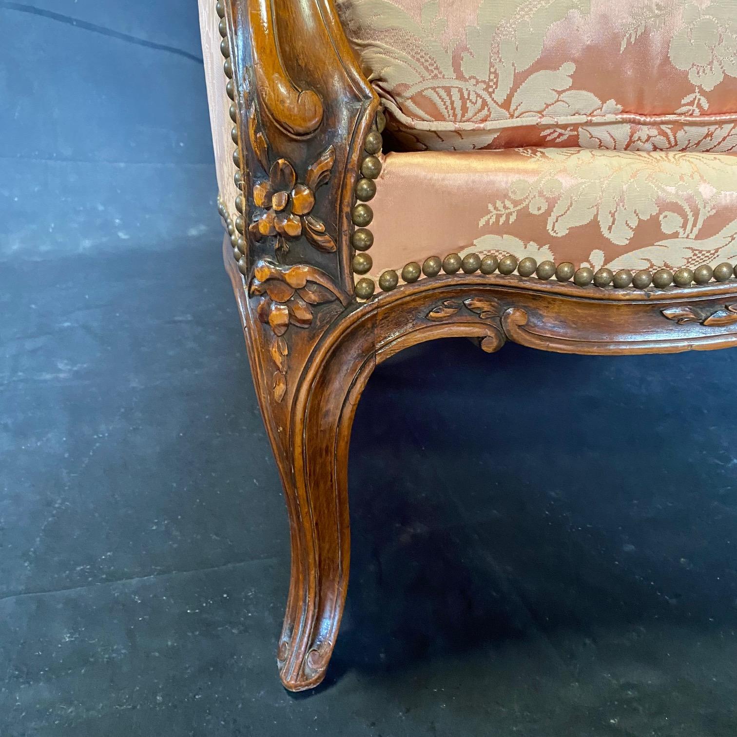 Exquisite Pair of Antique Louis XV Carved Walnut Bergere Chairs or Club Chairs  For Sale 6