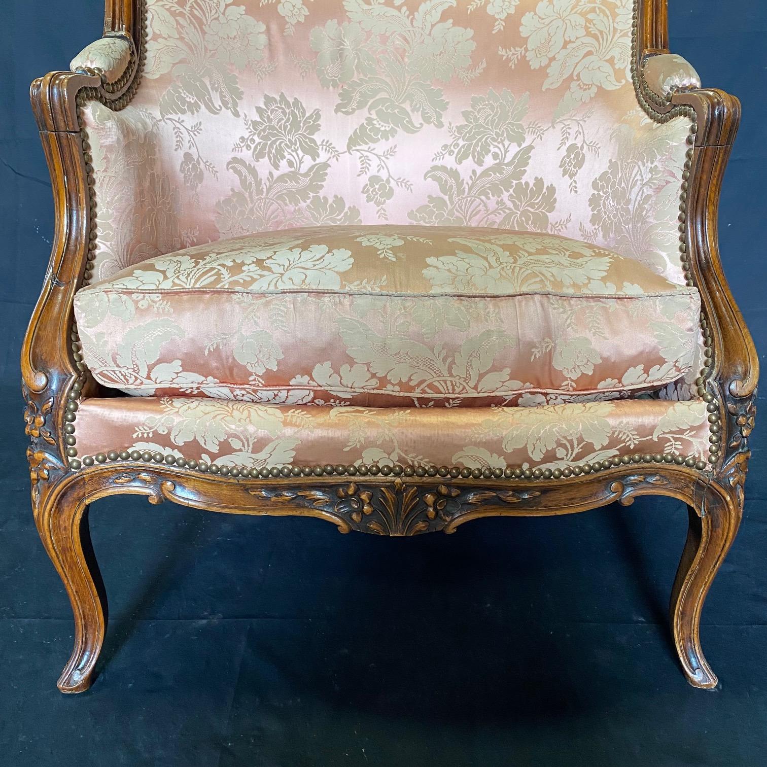 Exquisite Pair of Antique Louis XV Carved Walnut Bergere Chairs or Club Chairs  In Good Condition For Sale In Hopewell, NJ