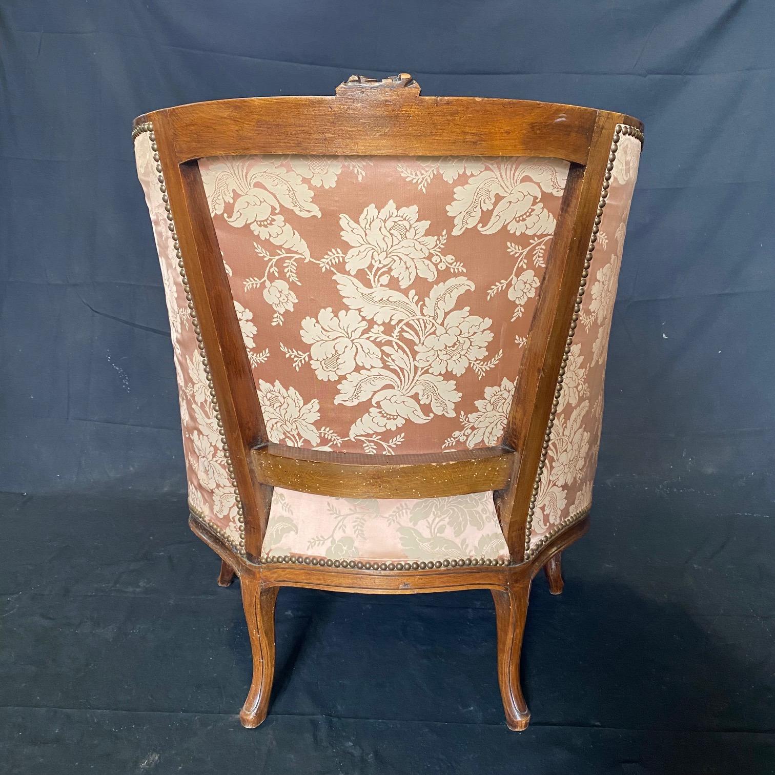 Early 20th Century Exquisite Pair of Antique Louis XV Carved Walnut Bergere Chairs or Club Chairs  For Sale