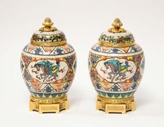 Exquisite Pair of French Ormolu-Mounted Chinese Style Porcelain Vases and Covers