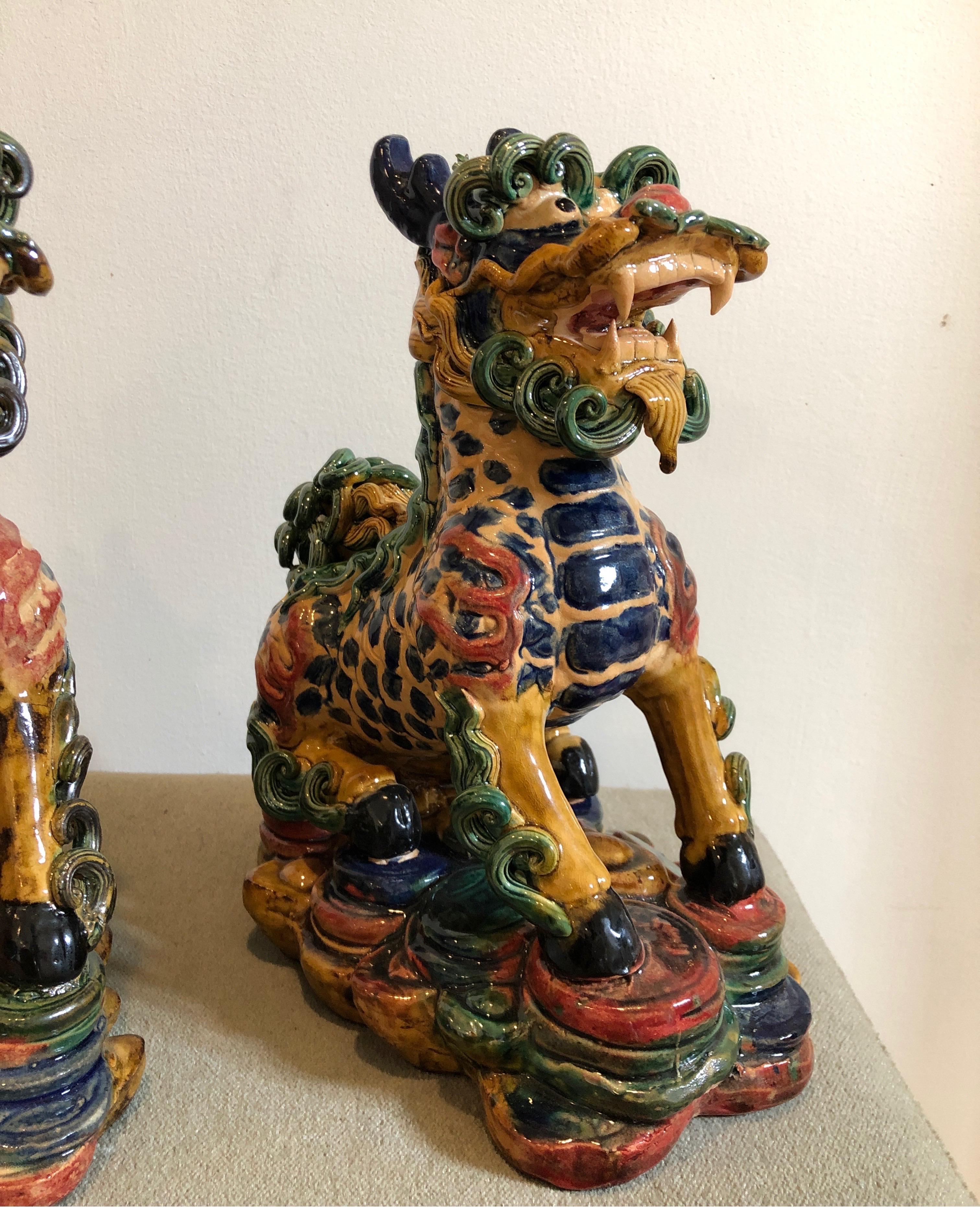 Chinese Exquisite Pair of Glazed Porcelain Foo Dogs For Sale