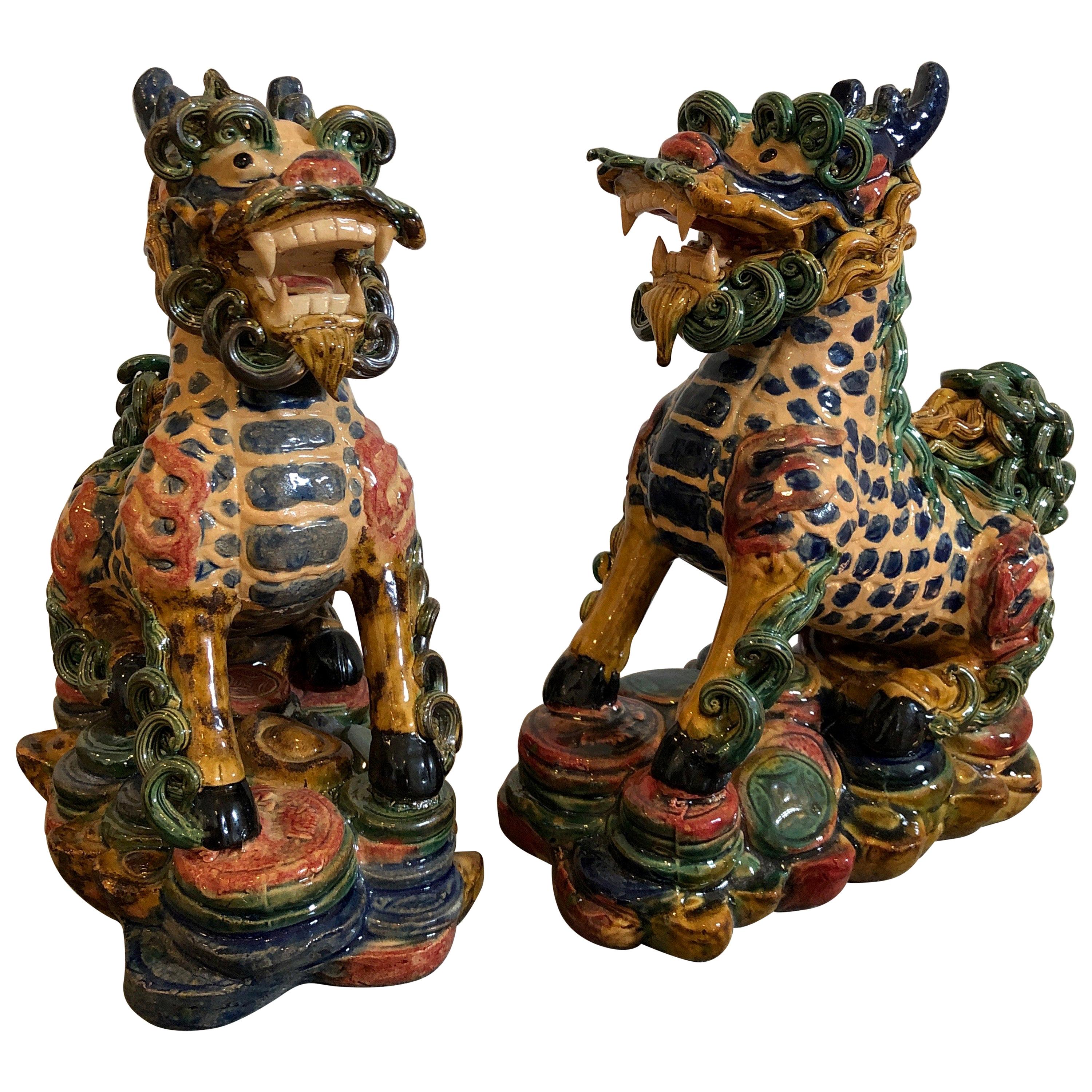 Exquisite Pair of Glazed Porcelain Foo Dogs For Sale