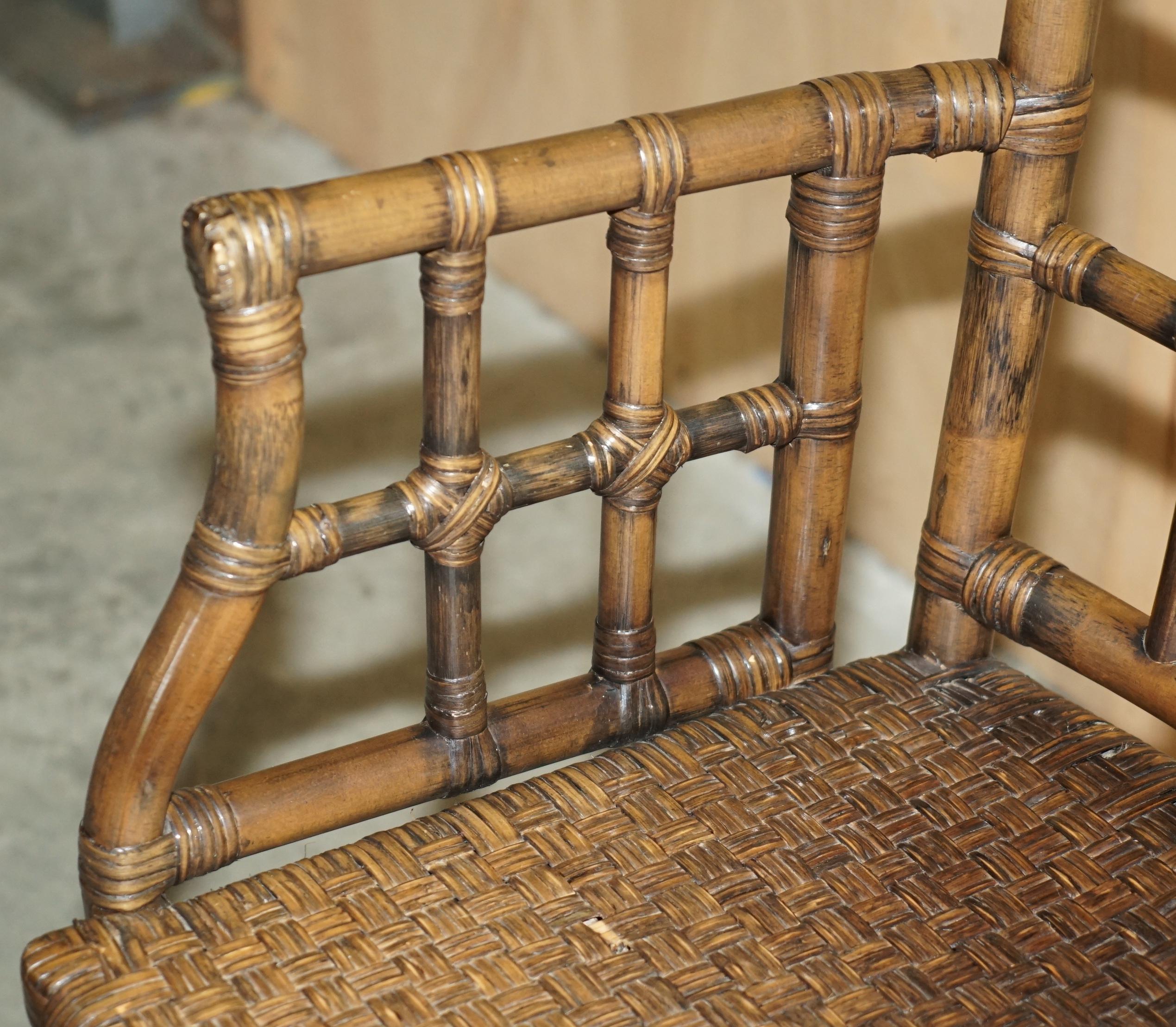 20th Century EXQUISITE PAIR OF MID CENTURY MCGUIRE RATTAN GOTHIC CATHEDRAL BACK ARMCHAIRs
