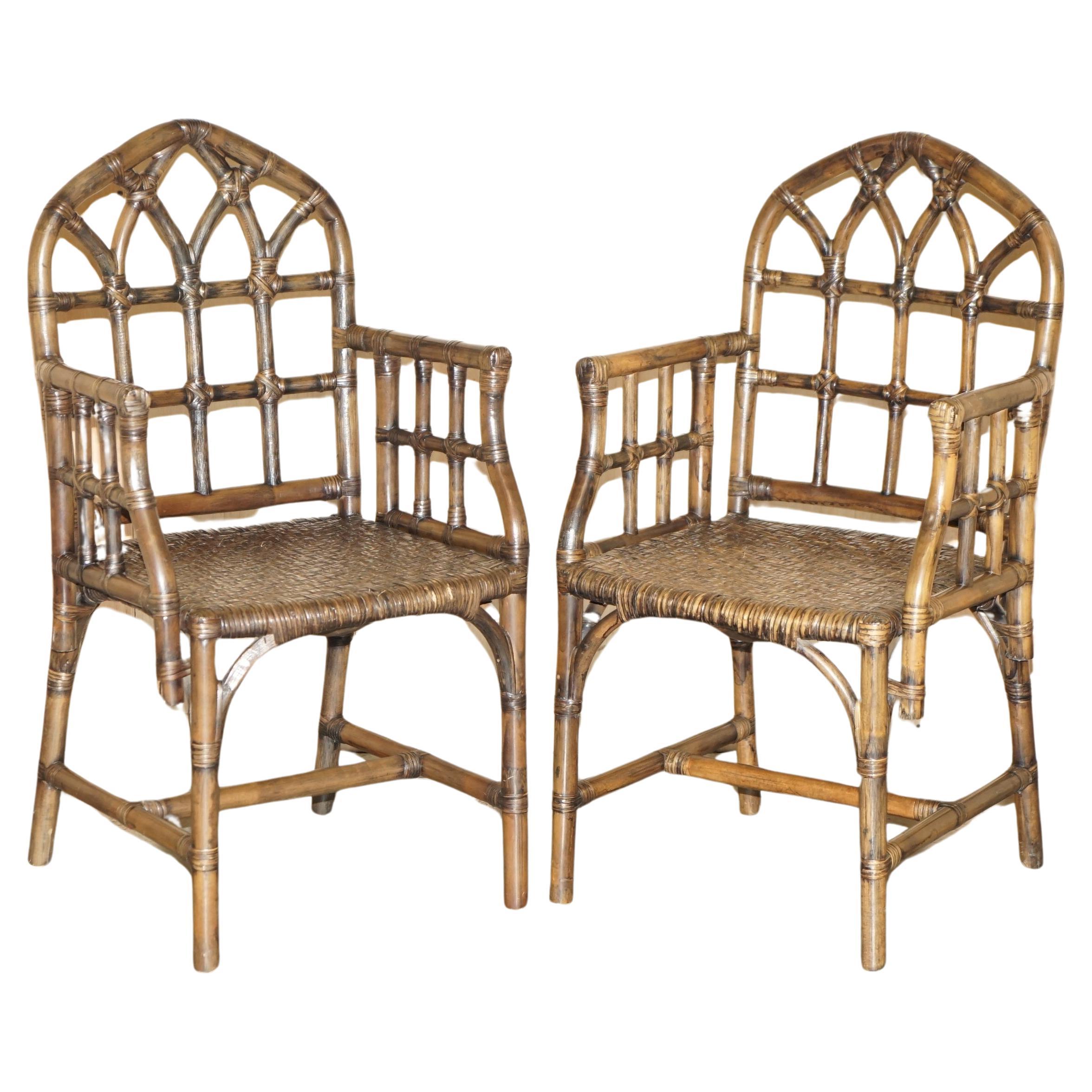 EXQUISITE PAIR OF MID CENTURY MCGUIRE RATTAN GOTHIC CATHEDRAL BACK ARMCHAIRs For Sale