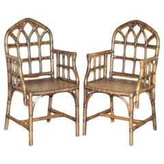 EXQUISITE PAIR OF MID CENTURY MCGUIRE RATTAN GOTHIC CATHEDRAL BACK ARMCHAIRs