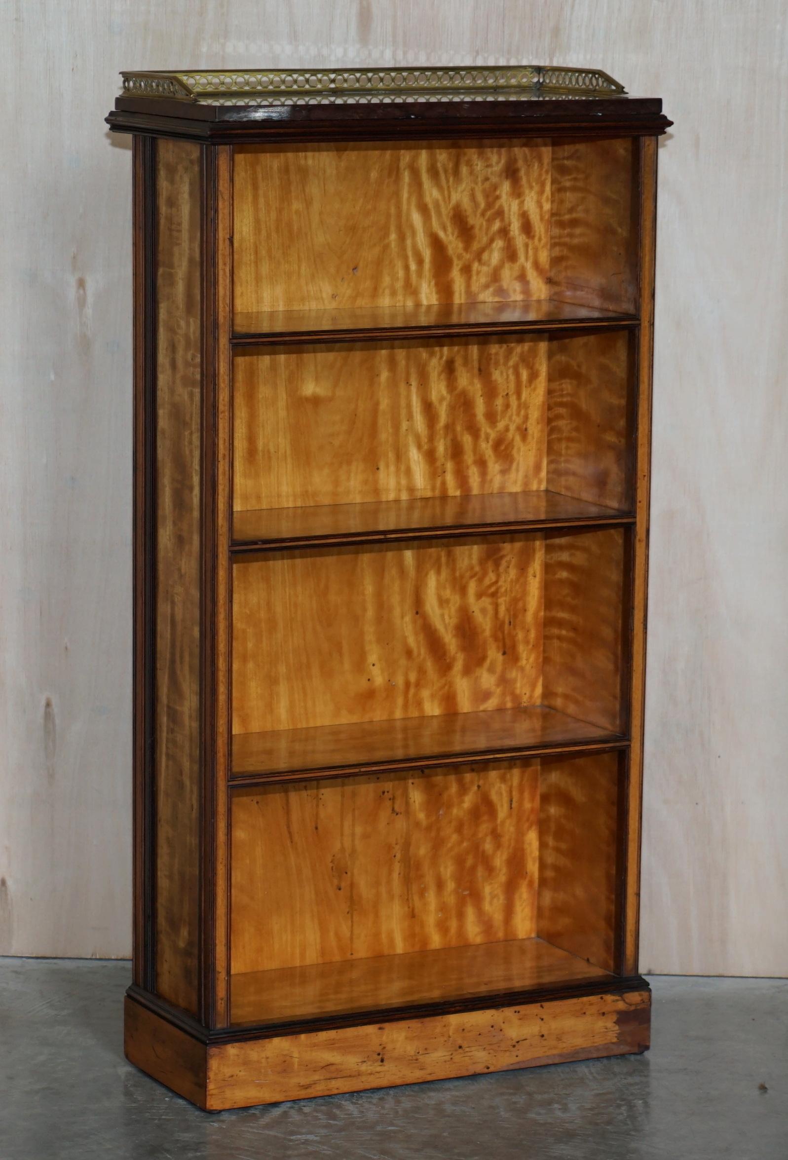 We are delighted to offer for sale this exquisite pair of very fine, Morison & Co Edinburgh dwarf open Library bookcases in Satin Birch and Rosewood with Italian Marble tops surmounted by pierced gallery rails

They are pretty much the finest pair