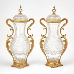 Exquisite Pair of Ormolu Mounted Crystal Scroll Form Handled Vases With Covers
