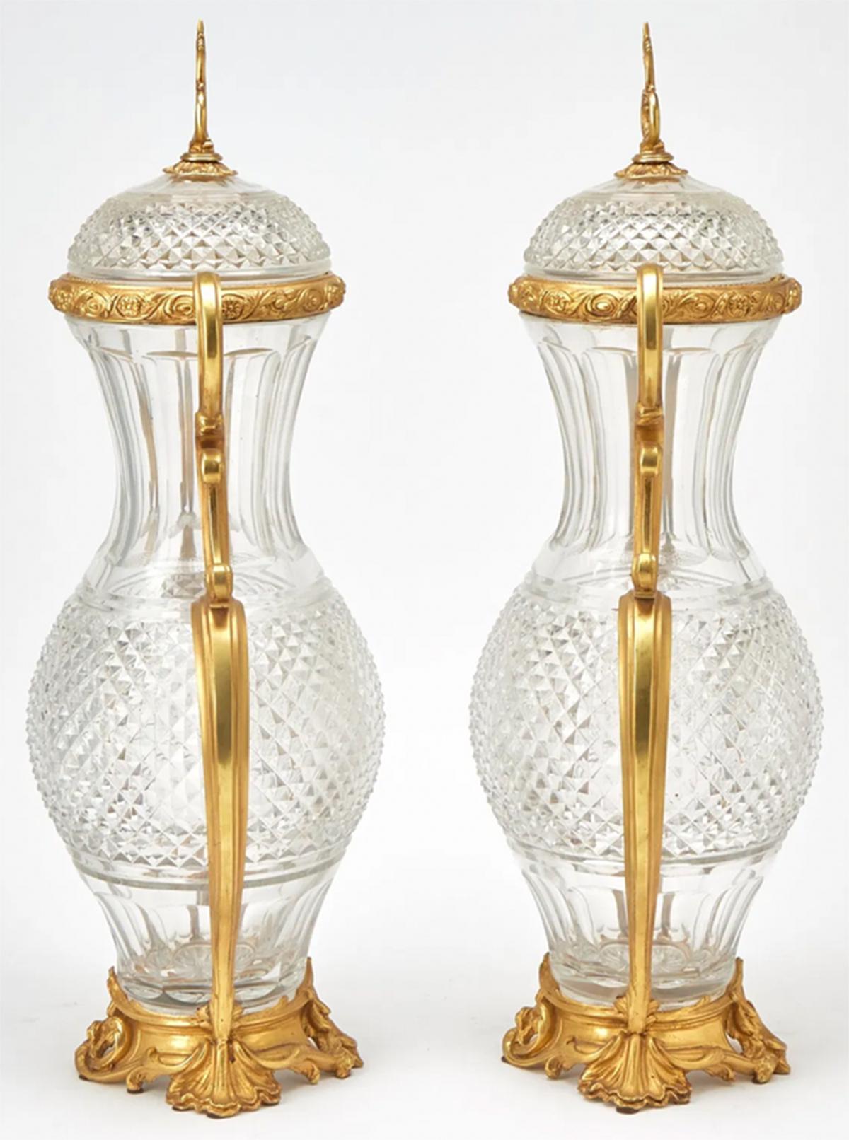 Cast Exquisite Pair of Ormolu Mounted Crystal Scroll Form Handled Vases With Covers For Sale