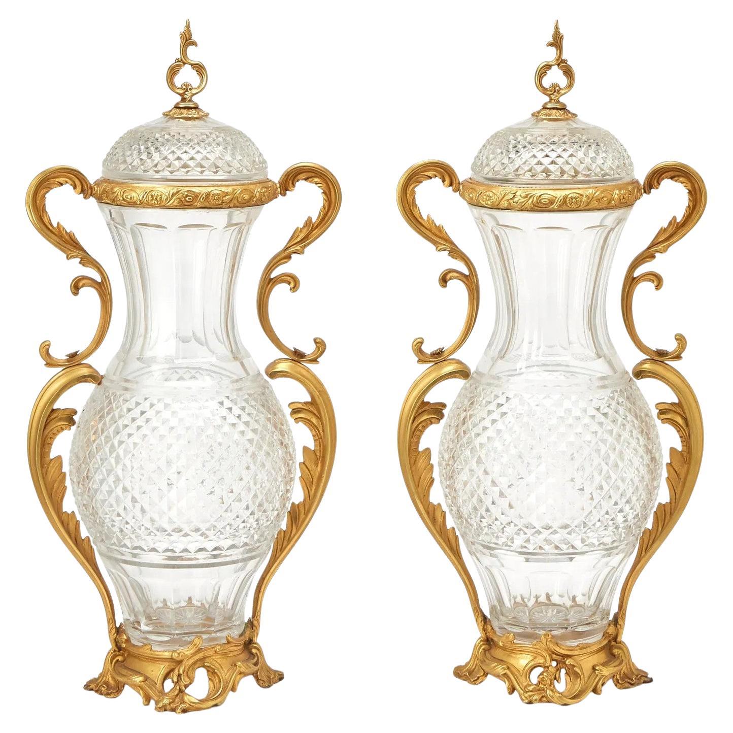 Exquisite Pair of Ormolu Mounted Crystal Scroll Form Handled Vases With Covers For Sale