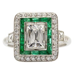 Vintage Exquisite Platinum GIA Certified Diamonds and Emeralds Ring