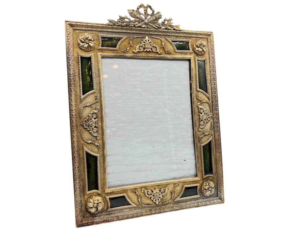 Exquisite quality French ormolu and green guilloche enamel frame.

Very good quality, no damage to the enamel.

Measures: Frame: 15 high x 11
