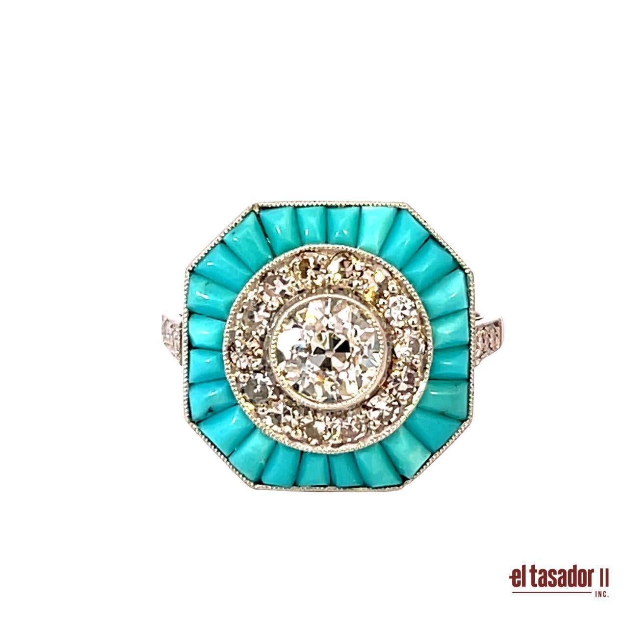 Exquise bague octogonale vintage en platine (6,5 g). En son centre brille un diamant taille brillant de 0,79 ct, entouré d'un halo de diamants plus petits totalisant 0,39 ct, ajoutant un éclat éblouissant et une grande sophistication. La monture