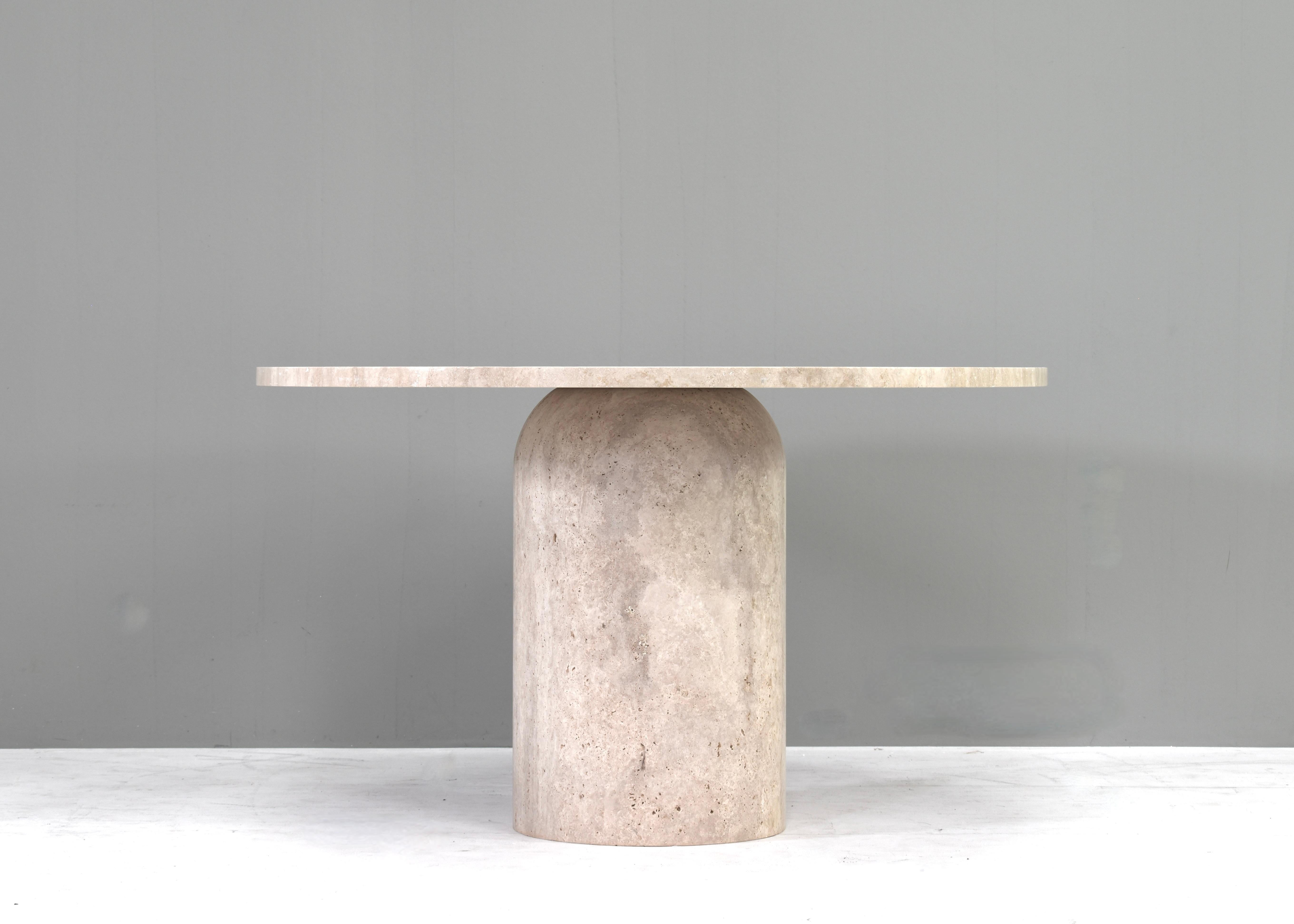 Introducing this exquisite Round Travertine Dining Table – Elegance in the Manor of Up&Up, Angelo Mangiarotti and Kelly Wearstler.

Indulge in the timeless allure of our Round Travertine Dining Table, exquisitely crafted to embody the sophisticated