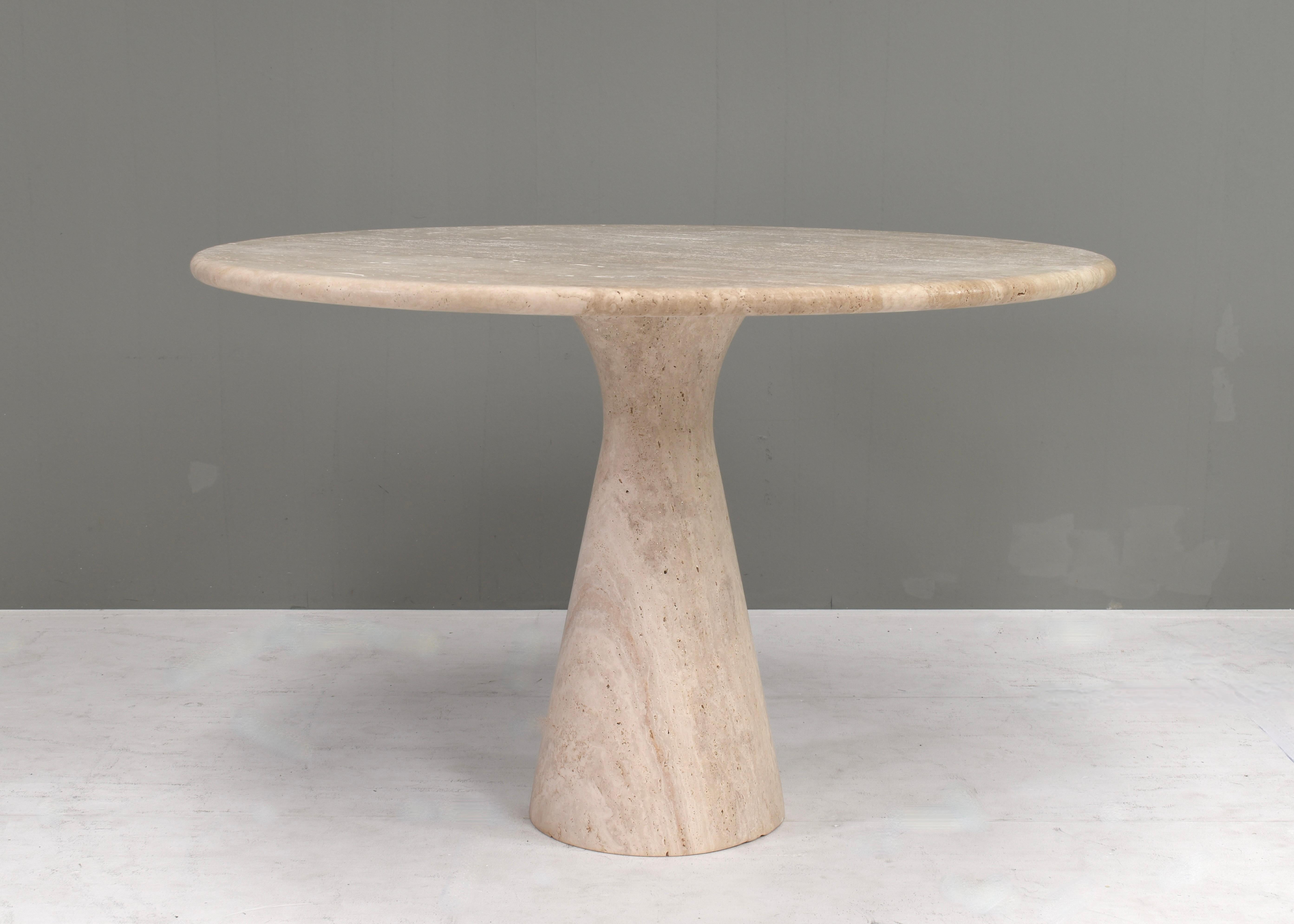 Introducing the Mangiarotti style dining table: a timeless Tribute to elegance and craftsmanship.
Immerse yourself in the world of Angelo Mangiarotti’s iconic designs with our exquisite Round Travertine Dining Table. Inspired by the legendary