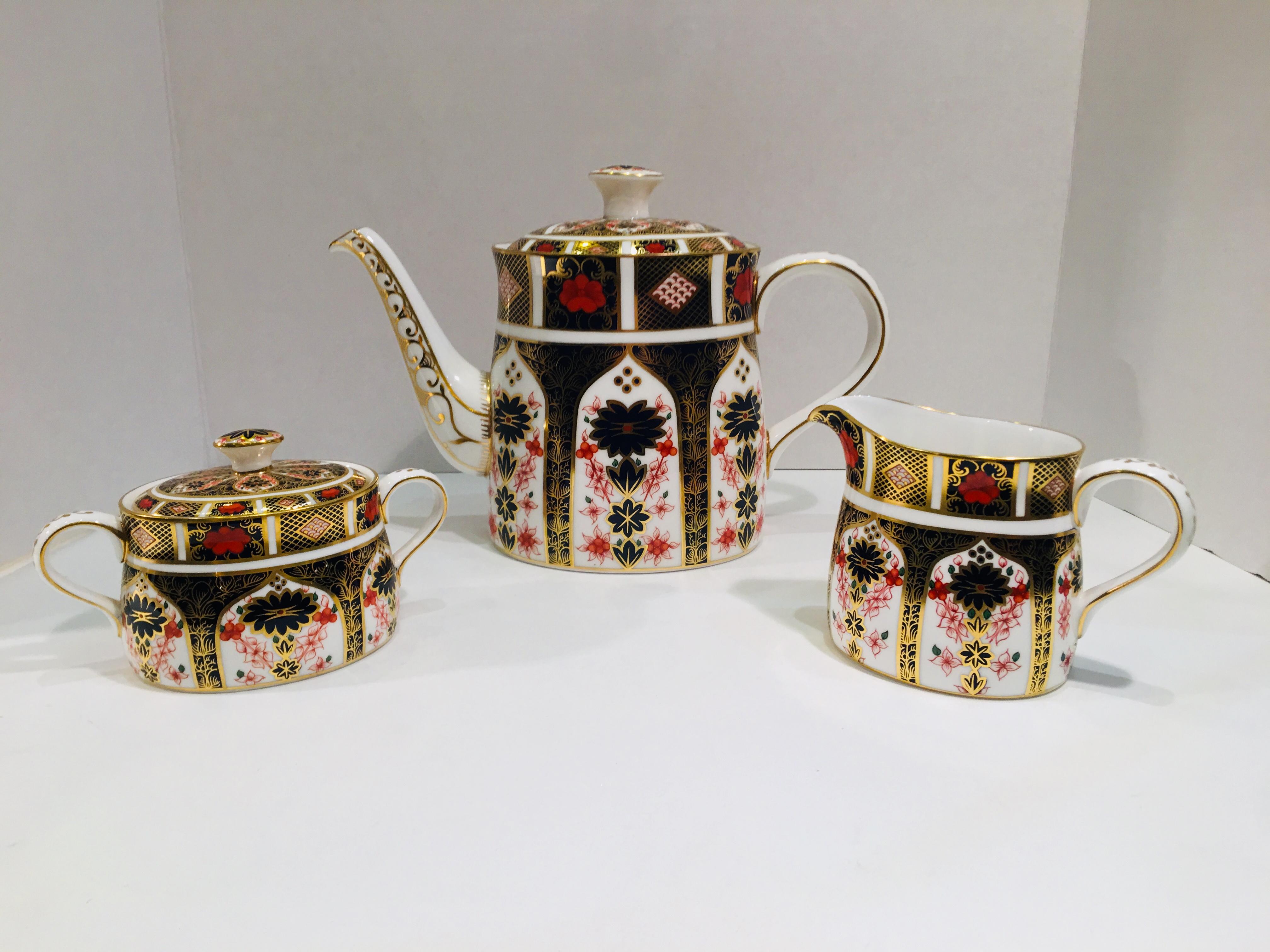 Timelessly elegant and of the finest quality, this classic bone china tea set from Royal Crown Derby in the 