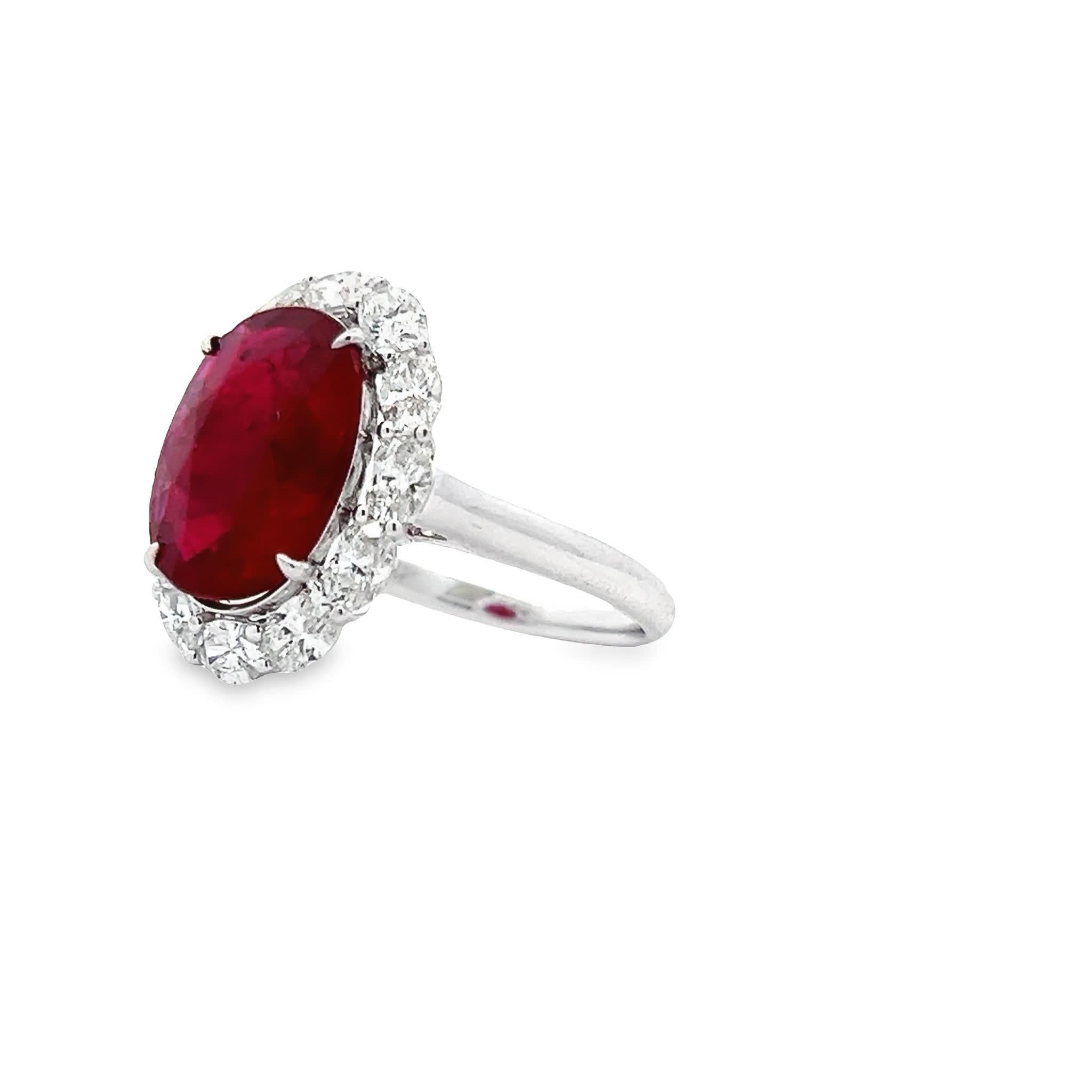 Adorn your fingers with a stroke of timeless elegance with our Radiant Ruby and Dazzling Diamond Elegance Ring.