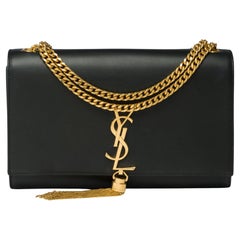 Exquisite Saint Laurent Kate shoulder bag in black leather, GHW