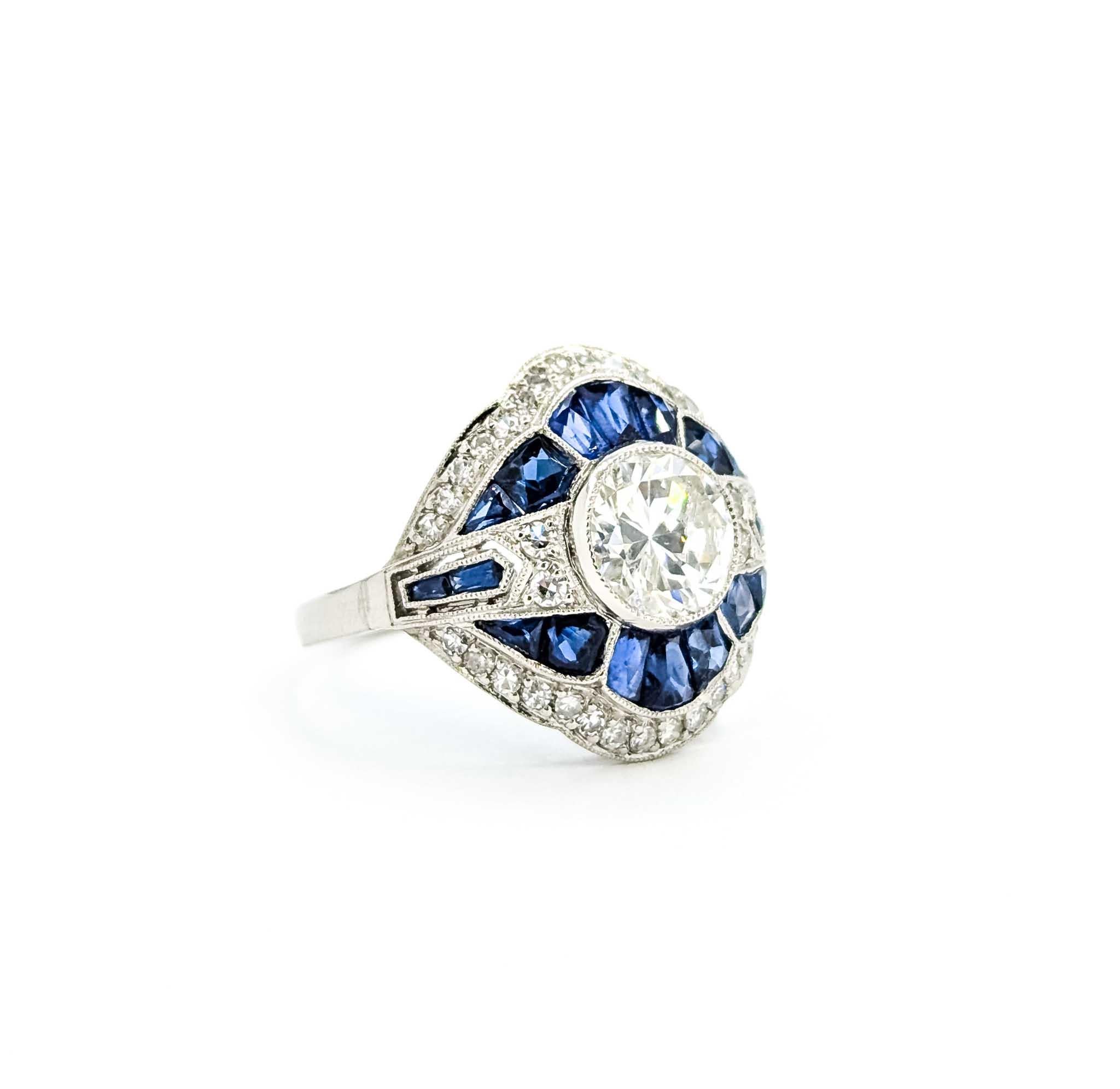 Exquisite Sapphire and Diamond White Gold Ring

Introducing this exquisite cocktail ring crafted in 900pt white gold, a masterpiece that beautifully encapsulates elegance and sophistication. The ring prominently features a stunning 1.17-carat