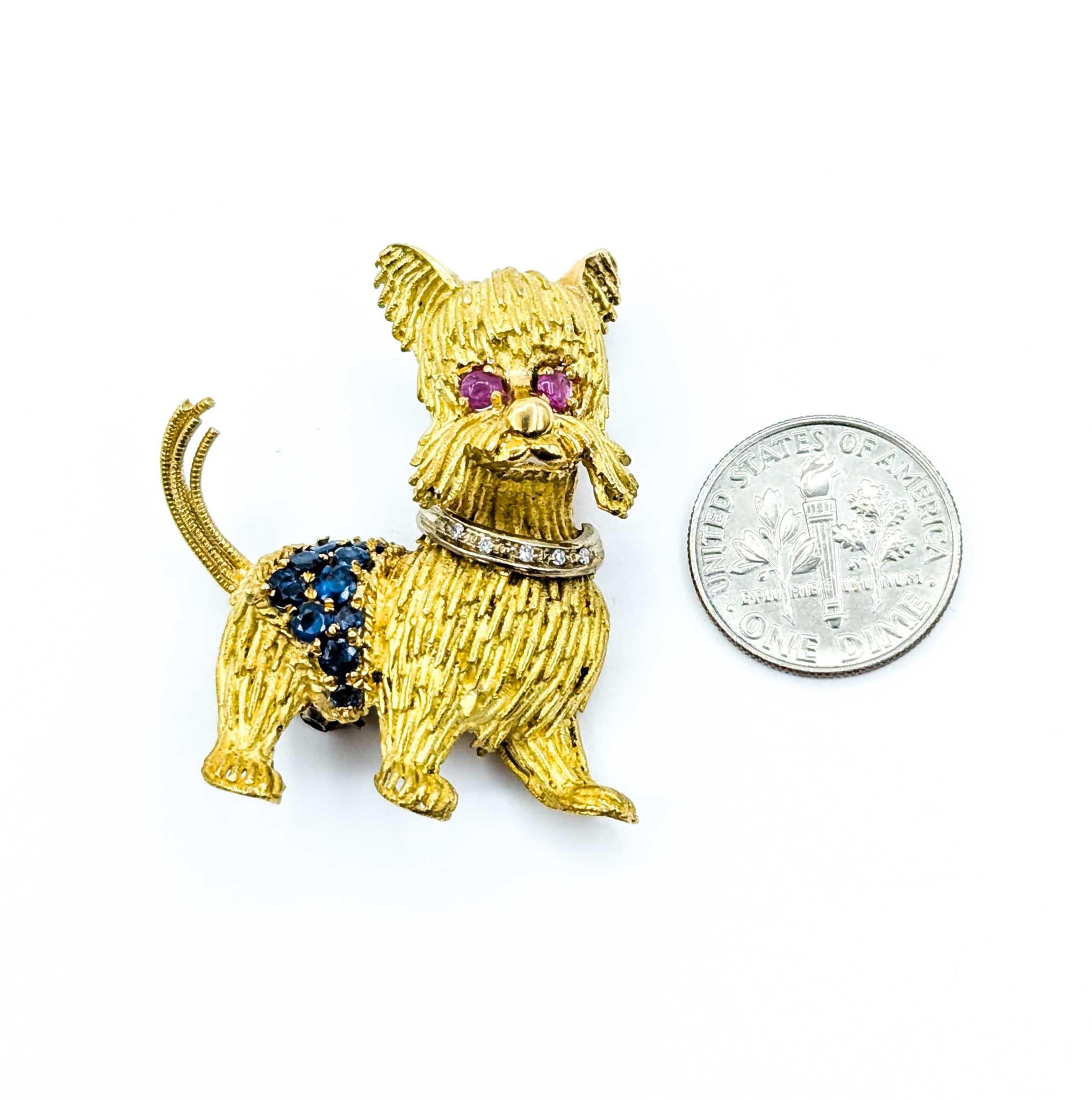 Exquisite Scottish Terrier Brooch in 14k Yellow Gold
Introducing this exquisite Scottish Terrier Brooch, beautifully crafted in 14k yellow gold. This charming piece features 0.04ctw of sparkling diamonds, 0.40ctw of vibrant rubies and sapphires, and
