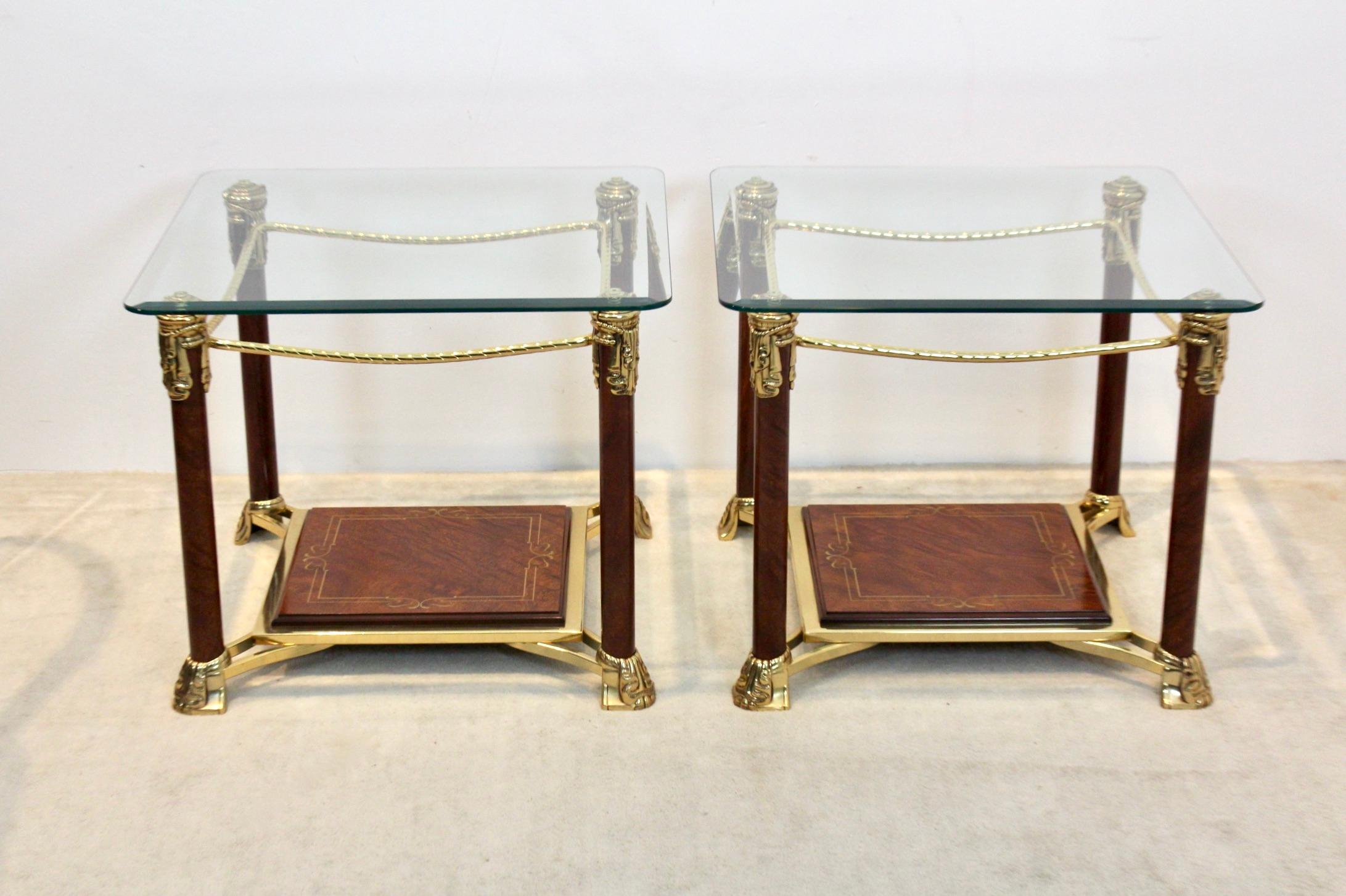 A truly beautiful set of brass and burr walnut side tables with solid glass tops. In true Hollywood Regency manner this elegant Hollywood Regency style pair have unique cut-out square designs. Produced in France circa 1970s. In very good