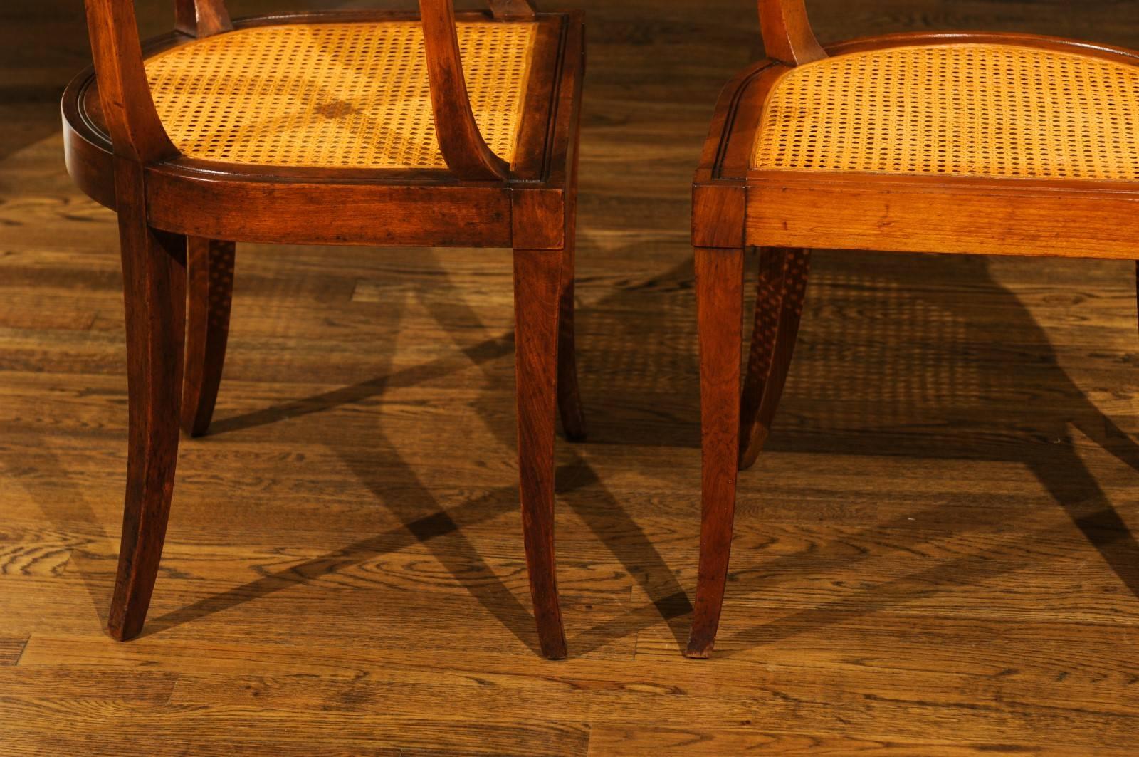 Exquisite Set of Twelve Klismos Cane Dining Chairs by Baker, circa 1958 In Excellent Condition In Atlanta, GA