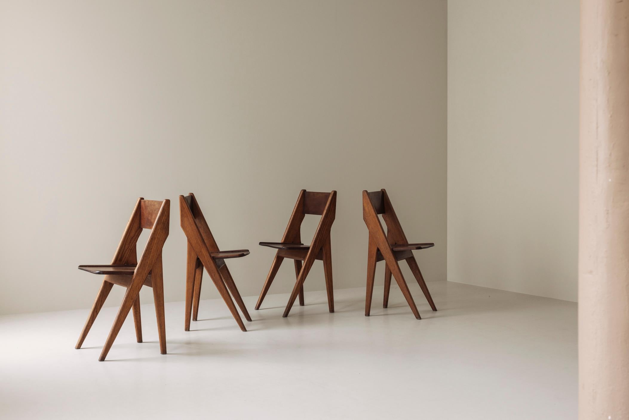 Exquisite set of four dining chairs in the manner of Jean Prouvé, France 1950s. 10