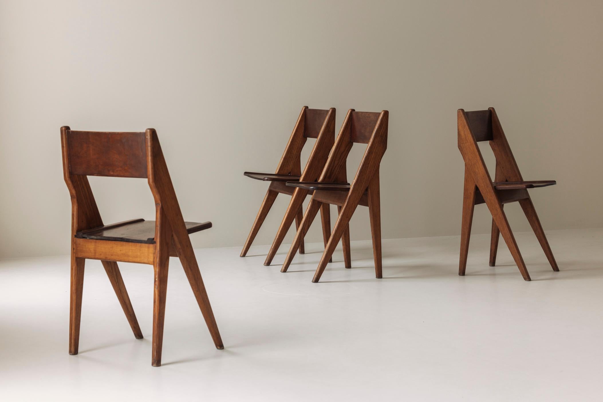 Mid-Century Modern Exquisite set of four dining chairs in the manner of Jean Prouvé, France 1950s.