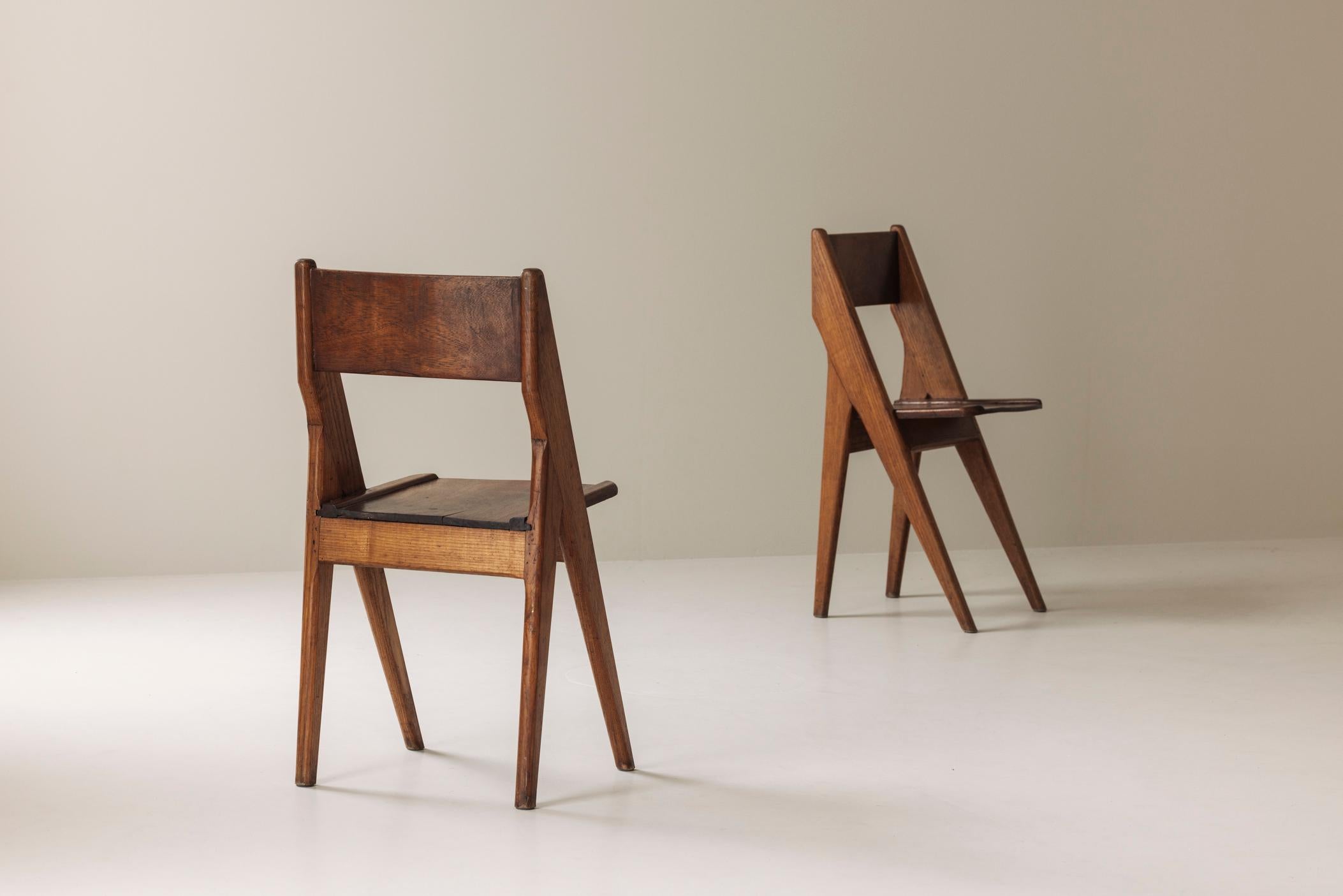 Exquisite set of four dining chairs in the manner of Jean Prouvé, France 1950s. In Good Condition In Antwerp, BE