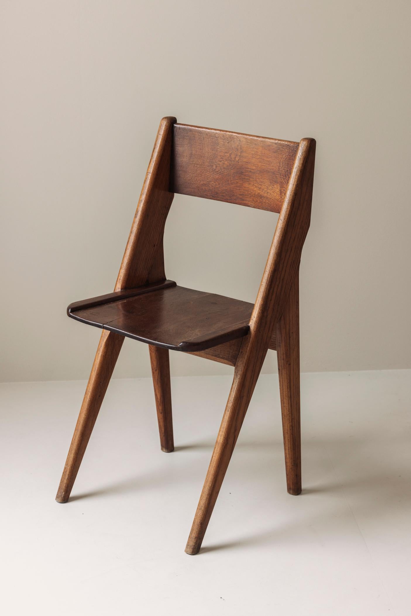 Mid-20th Century Exquisite set of four dining chairs in the manner of Jean Prouvé, France 1950s.
