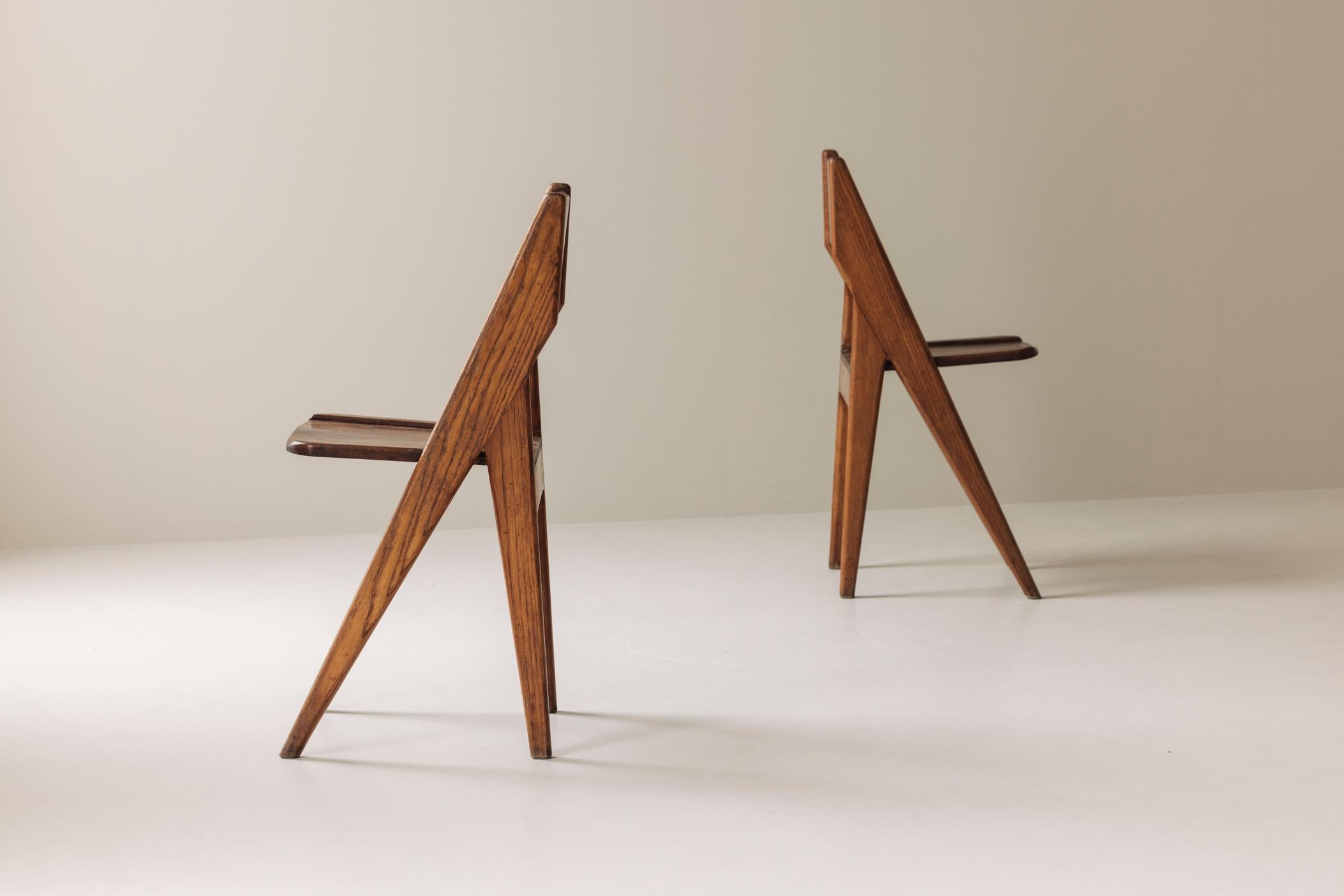 Exquisite set of four dining chairs in the manner of Jean Prouvé, France 1950s. 2