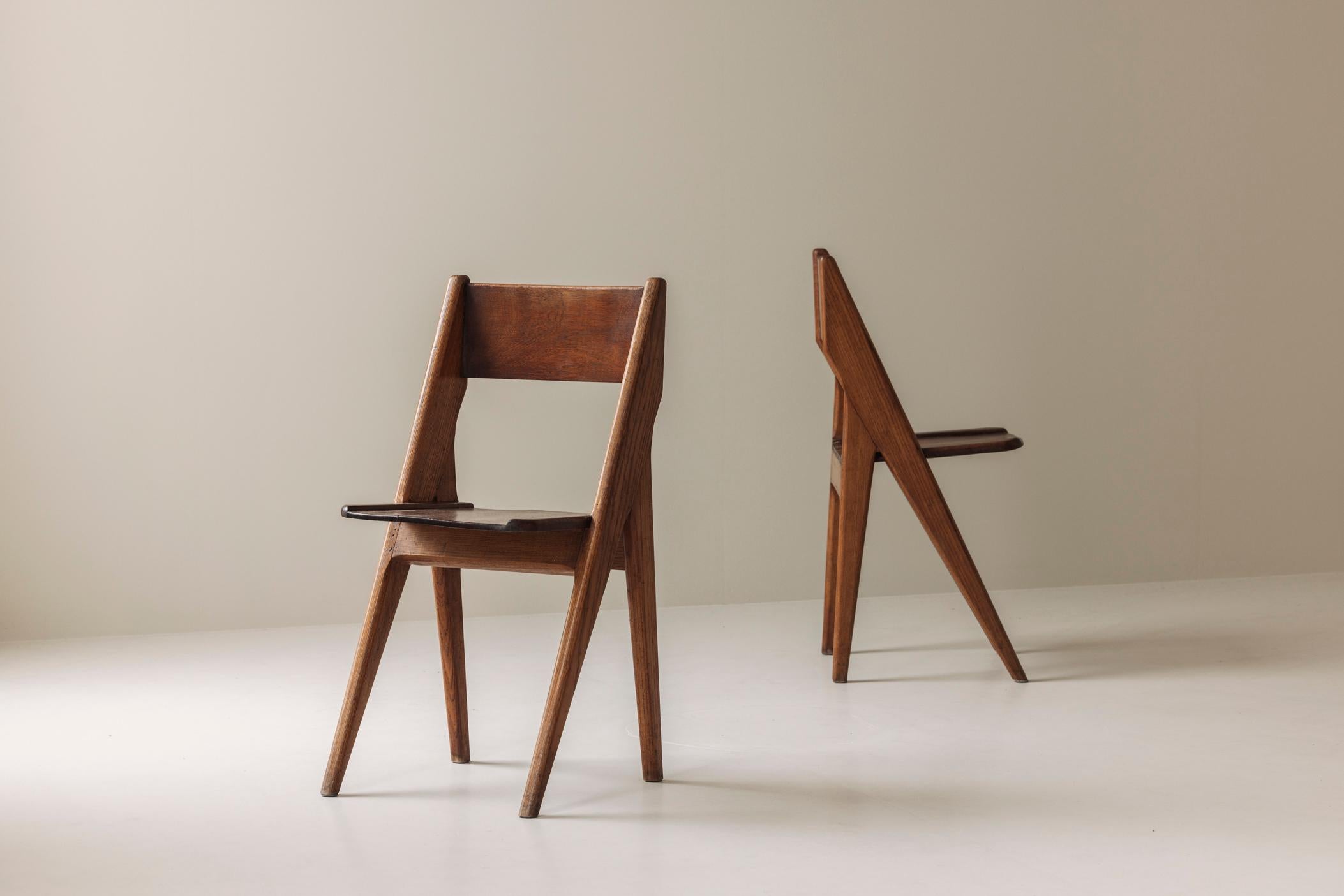 Exquisite set of four dining chairs in the manner of Jean Prouvé, France 1950s. 3