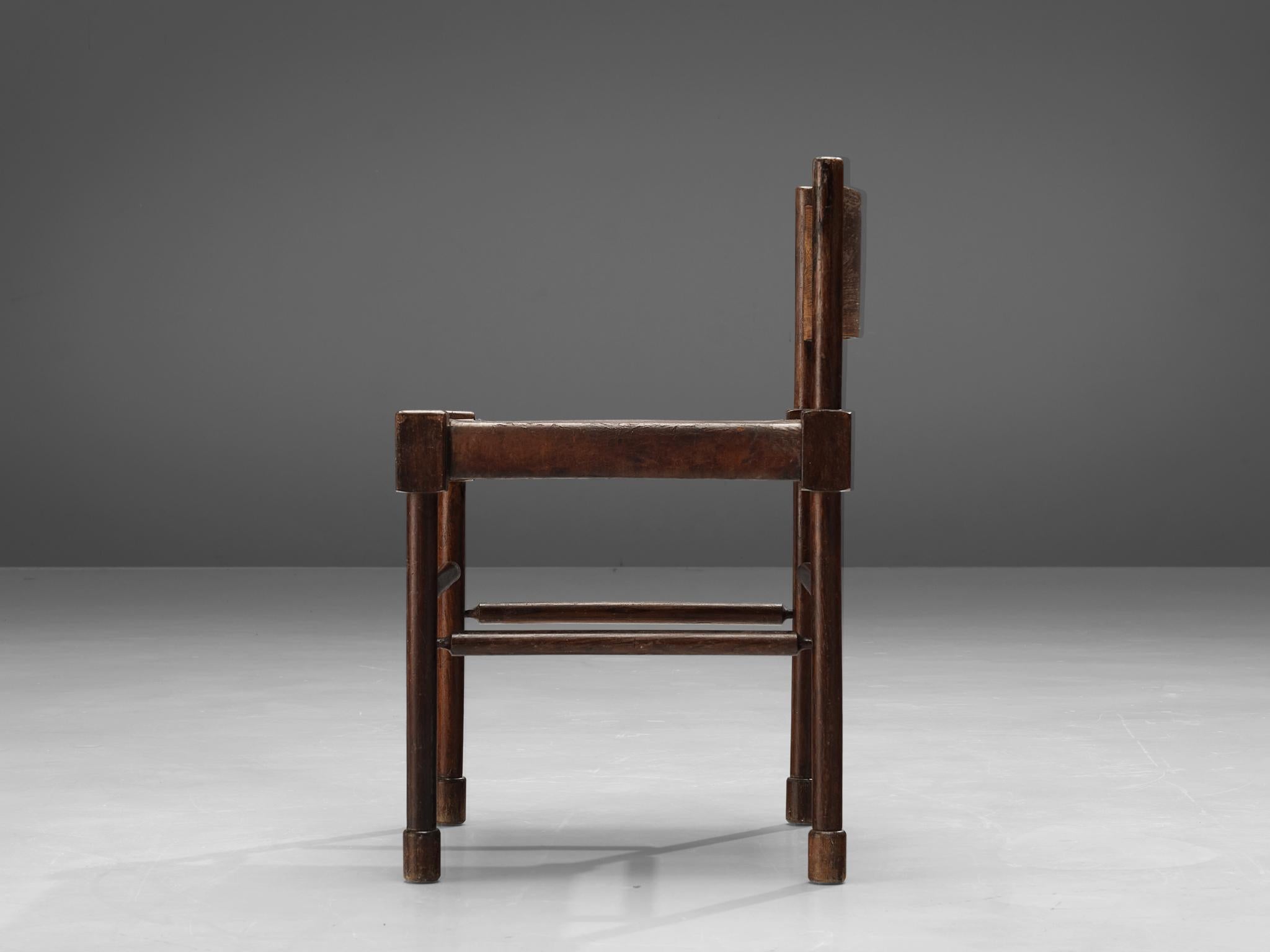 Side chair, stained wood, patinated leather, Brazil, 1940s

Rare side chair with sculpted frame in stained wood and leather seat. What makes this design so unique is the way the designer played with proportions and shapes. The detailed carved frame