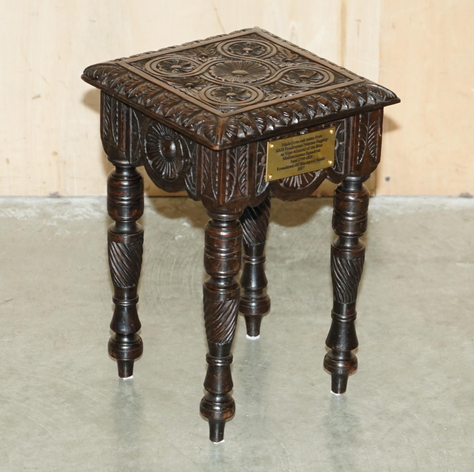 Royal House Antiques

Royal House Antiques is delighted to offer for sale this absolutely stunning antique side table with a brass engraved  plaque and hand written note detailing its Nelson's provenience as being made from the reclaimed timber of