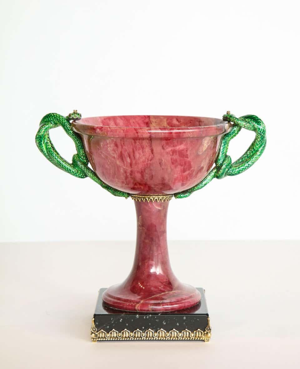 An exquisite silver, marble, & diamond mounted rhodonite bowl with snake handles, 20th century.  

This object is so precious and rare. With silver mounts, exceptional quality enameling on the snake handles, and diamond eyes, this bowl is a true