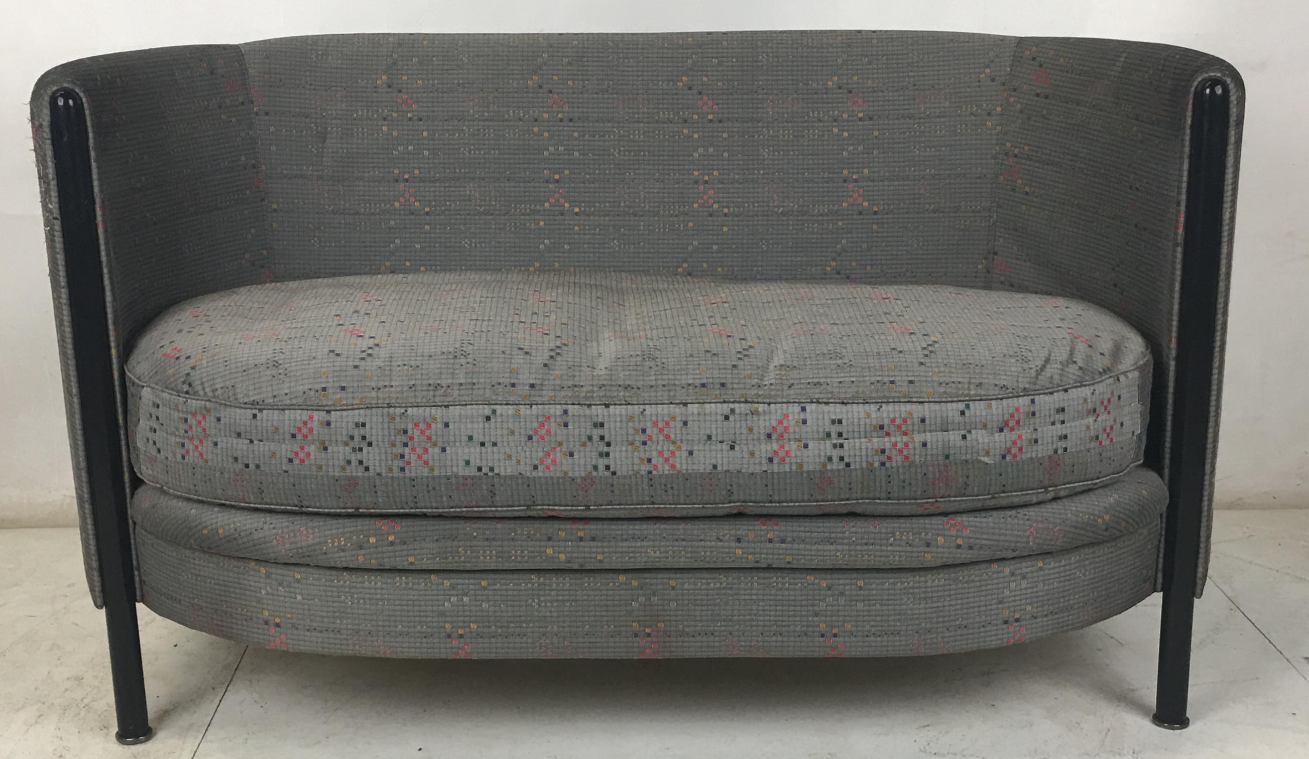 Beautifully rendered shelter style settee by the venerable Moroso, Italy. The quality and workmanship are first rate as expected from Moroso. Original upholstery is worn and should be replaced. Legs are enameled steel with polished steel glides.
