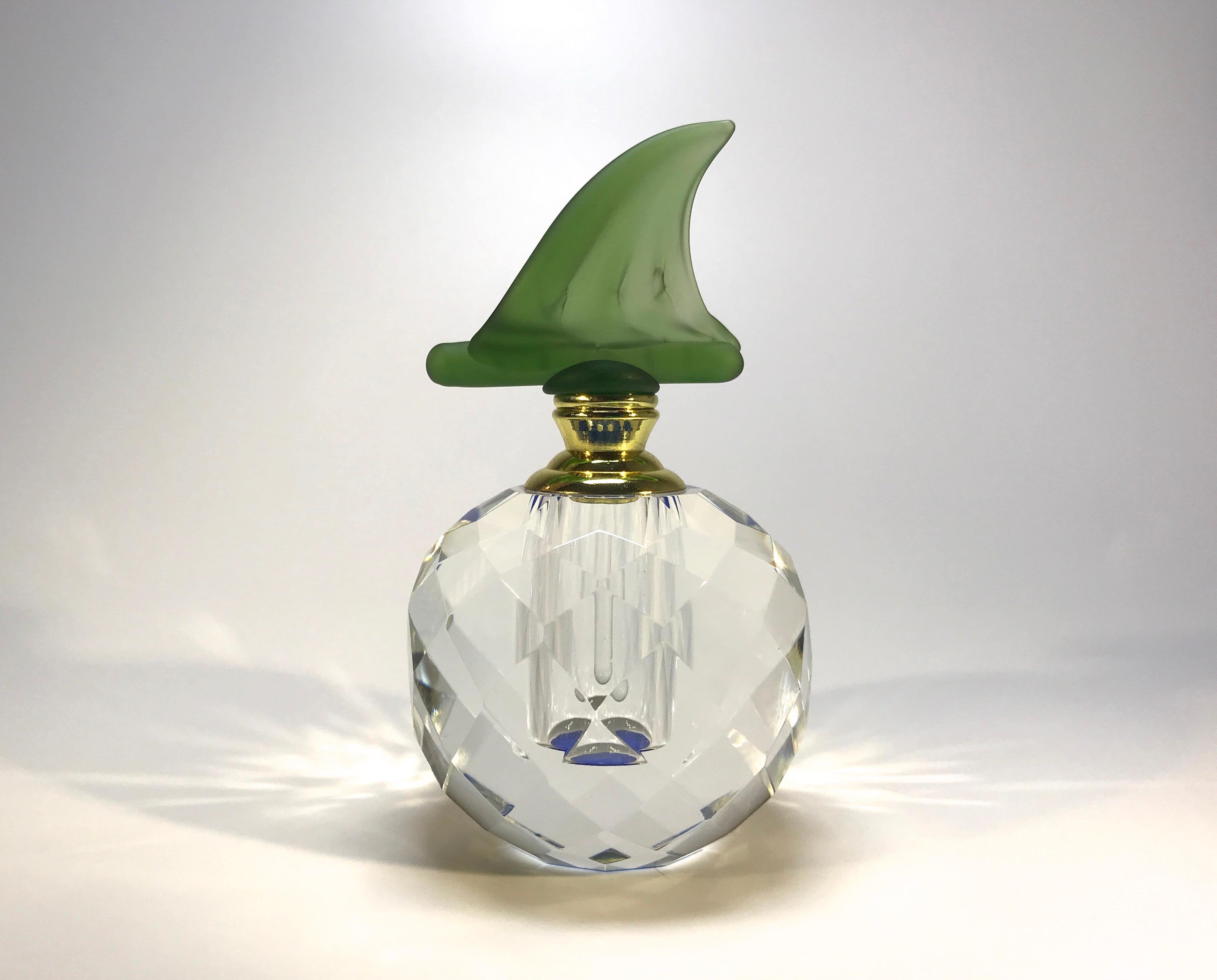 Absolutely exquisite crystal perfume bottle with a soft moss green Páte-de-Verre glass stopper
Gold colored collar. The glass pipet scent rod is in perfect condition
This piece has been carefully pre-owned and has a blue protective felt to the